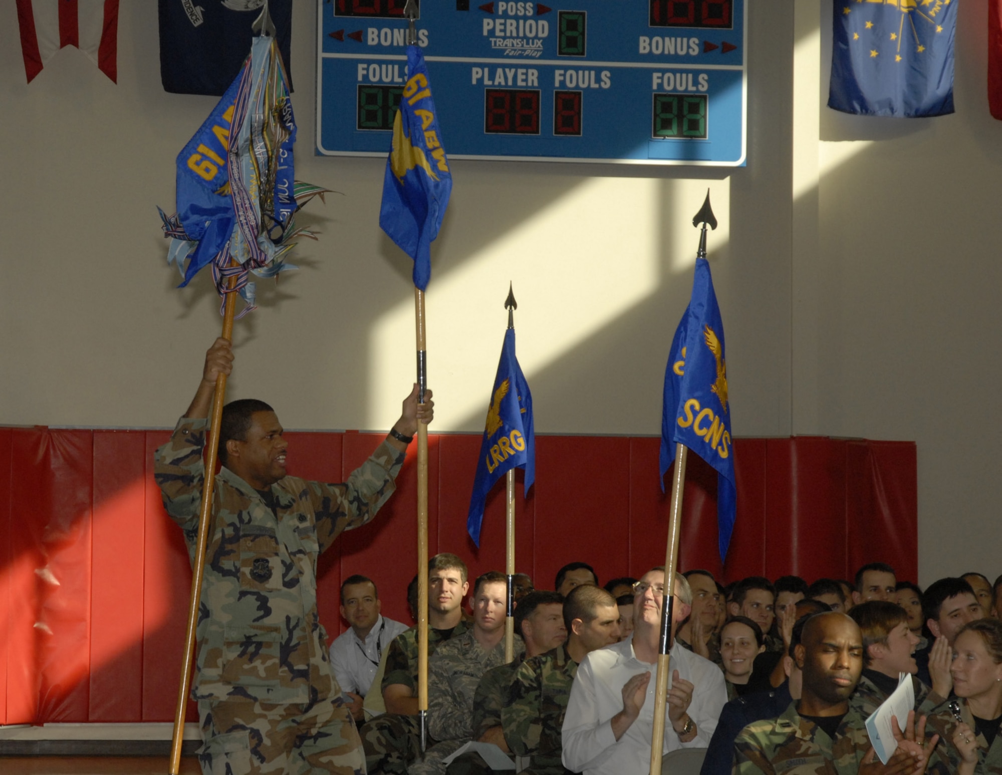 Tech. Sgt. David McCloud, 61st Mission Support Group, shows his team spirit during the SMC Quarterly Awards, Jan. 31. (Photo by Joe Juarez)