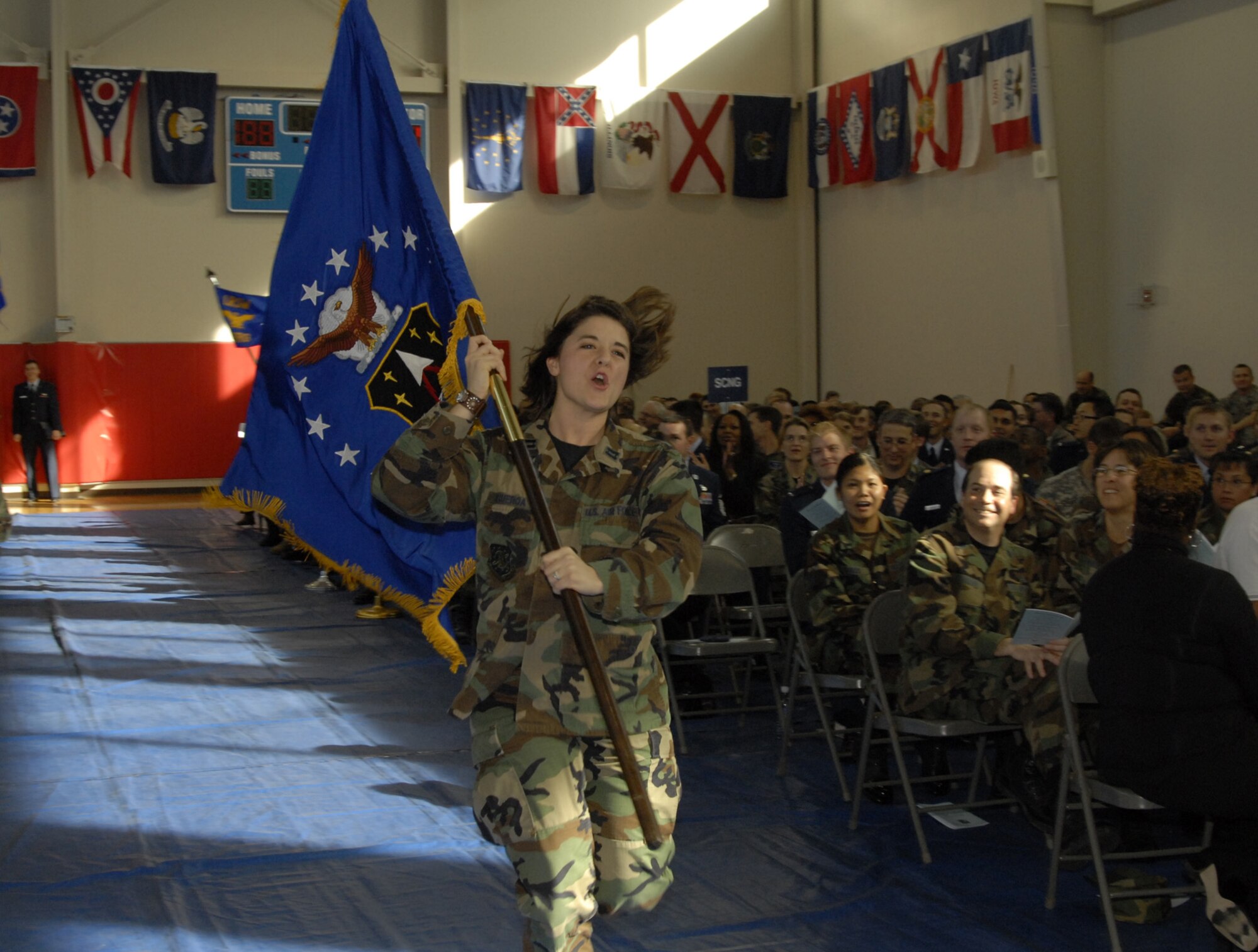 Capt. Shana Figueroa leads the Launch and Range Systems Wing’s cheer. The wing took the Team Sprit crown at the SMC Quarterly Awards, Jan. 31. (Photo by Joe Juarez)