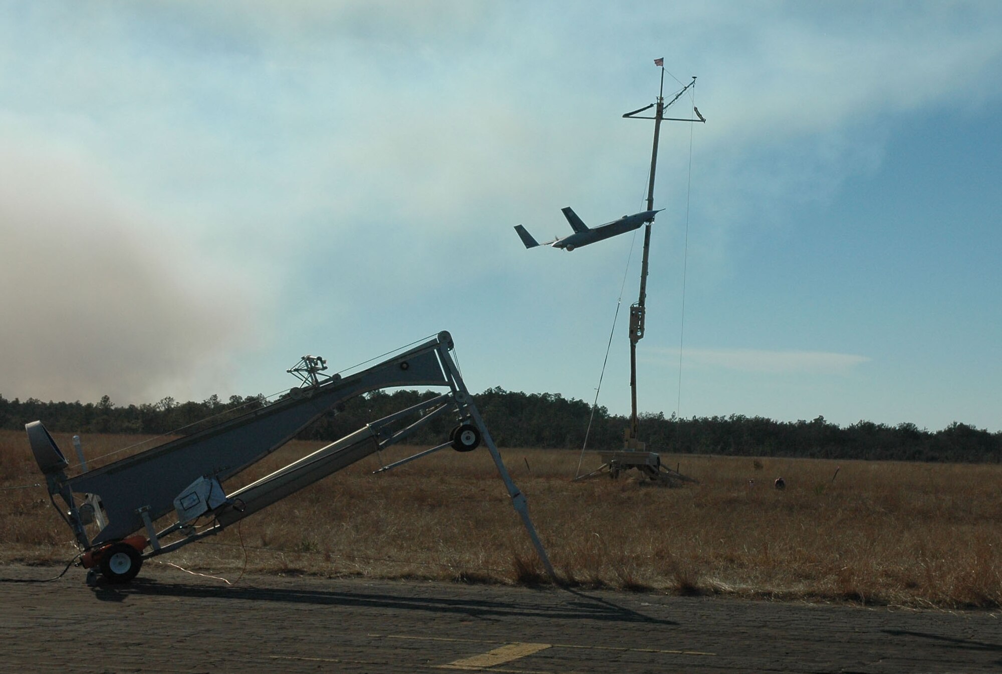 The Scan Eagle small unmanned aircraft system takes flight here at the Eglin Air Force Base test range Feb. 7. It is a portable system which features three Air vehicles, a ground control station, a remote video terminal, and a launch and recovery system. (U.S. Air Force Photo/ Master Sgt. Buffy Galbraith)