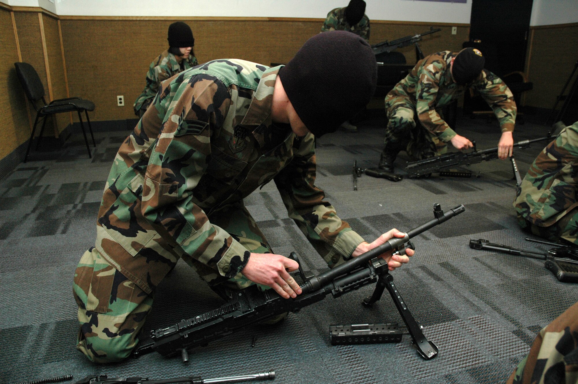 Nineteen Airmen from the 741st Security Forces Squadron Jackal Flight participated in a blindfolded weapon disassembly and re-assembly competition in building 500 Feb. 8. Eight Airmen participated with M-240B machine guns and the remaining 11 Airmen competed with M-4 Carbine rifles. Each weapon was given a functionality test following re-assembly to ensure proper assembly. Airman Wesley Gabrielson won the best time for M4 Carbine rifle in 1:20. Airmen 1st Class Adam Sharp and Timothy McCoy tied for best M-240B machine gun time of 40 seconds. (U.S. Air Force photo/Airman 1st Class Dillon White)