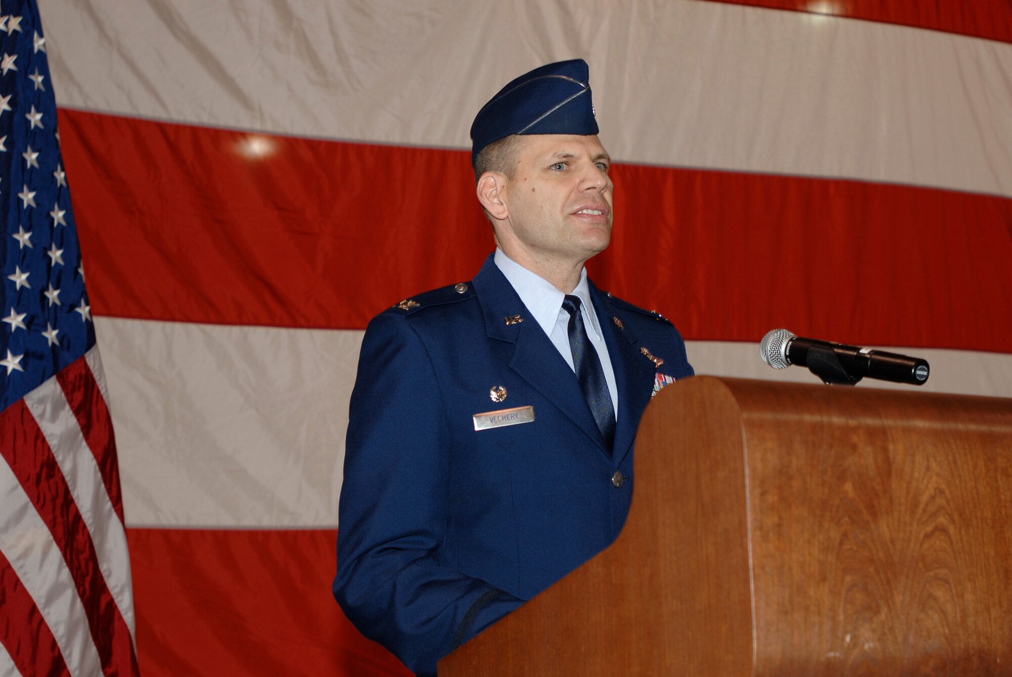 MCCONNELL AIR FORCE BASE, Kan. -- Col. James Vechery, 22nd Air Refueling Wing commander, speaks to Team McConnell and local community members, Feb. 8, after assuming his role as wing commander during a change of command ceremony here. (Photo by Senior Airman Jamie Train) 