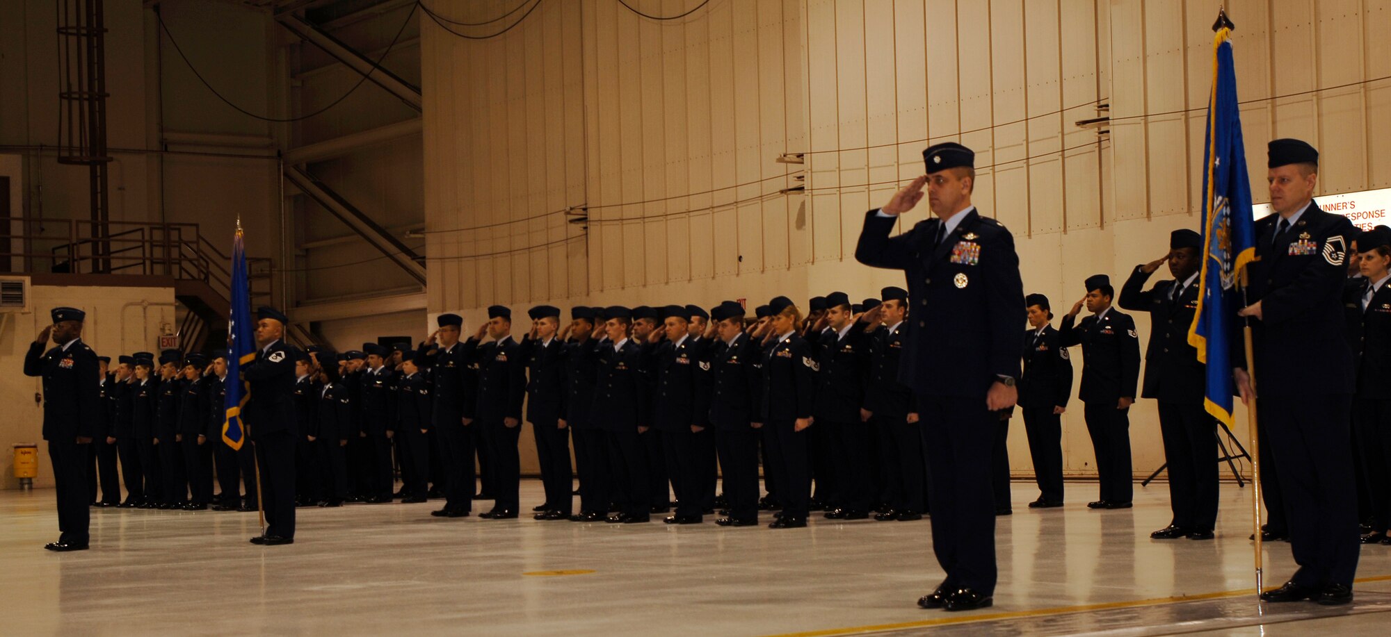 MCCONNELL AIR FORCE BASE, Kan. – The men and women of the 22nd Air Refueling Wing render Col. James Vechery, 22nd ARW commander, a first official salute to the new commander at his change of command ceremony here, Feb. 8. (Photo by Senior Airman Jamie Train)