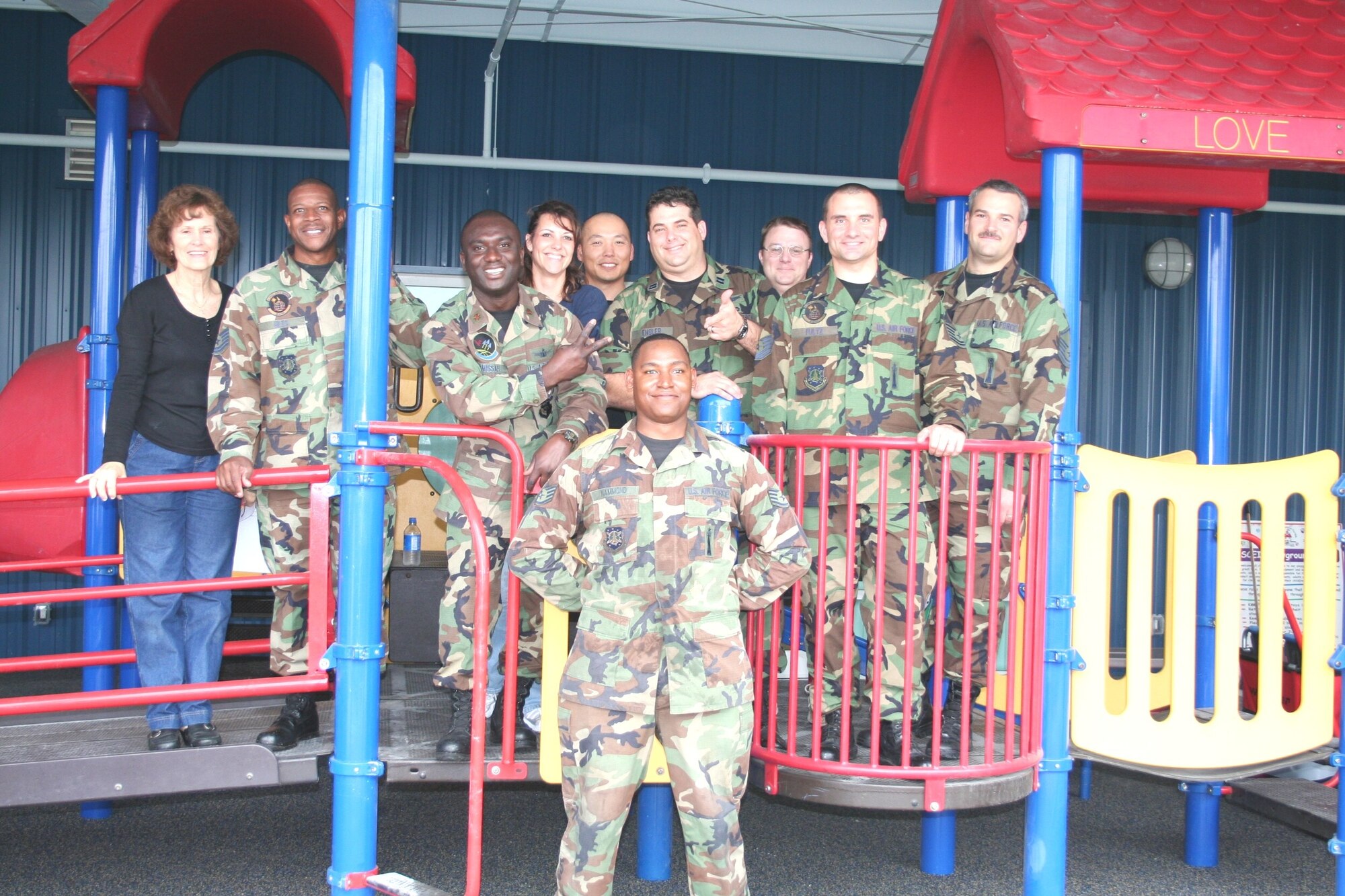 Volunteers from the 45th Space Wing with faculty members from the Space Coast Early Intervention Center during the Center's recent move. (Courtesy photo)