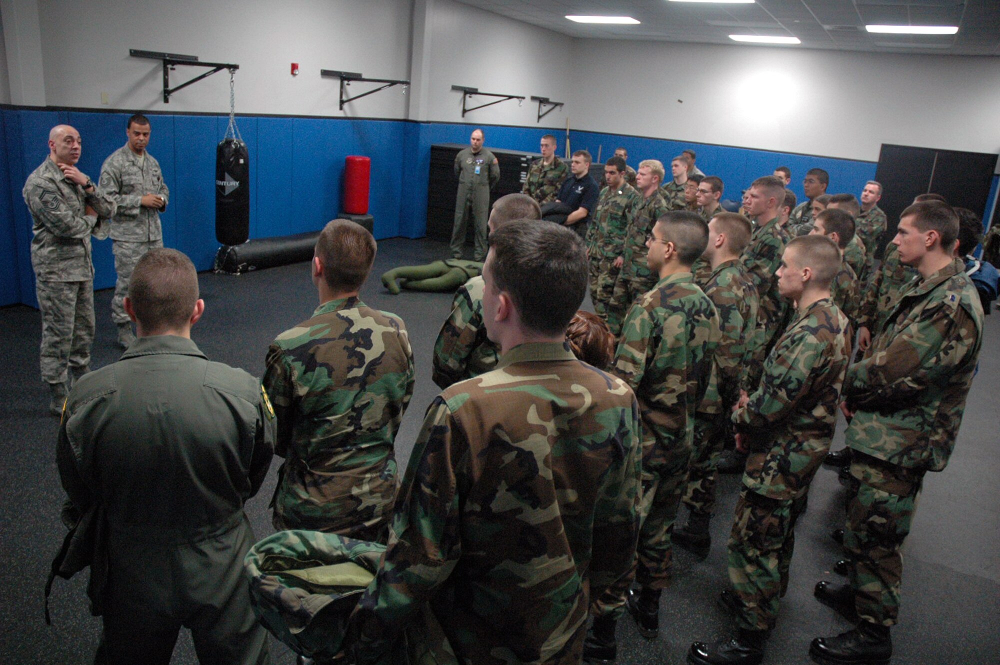 Senior Master Sgt. Dominic Perino, U.S. Air Force Expeditionary Center's Concepts Demonstration Program, and Master Sgt. Troy Coville, Mobility Operations School, talk with cadets and staff from the Rennsselaer Polytechnic Institute of New York as part of senior NCO panel for their tour Feb. 8, 2008, at the Center on Fort Dix, N.J.  The students learned about the Center's training programs for expeditionary and mobility air forces.  (U.S. Air Force Photo/Tech. Sgt. Scott T. Sturkol()