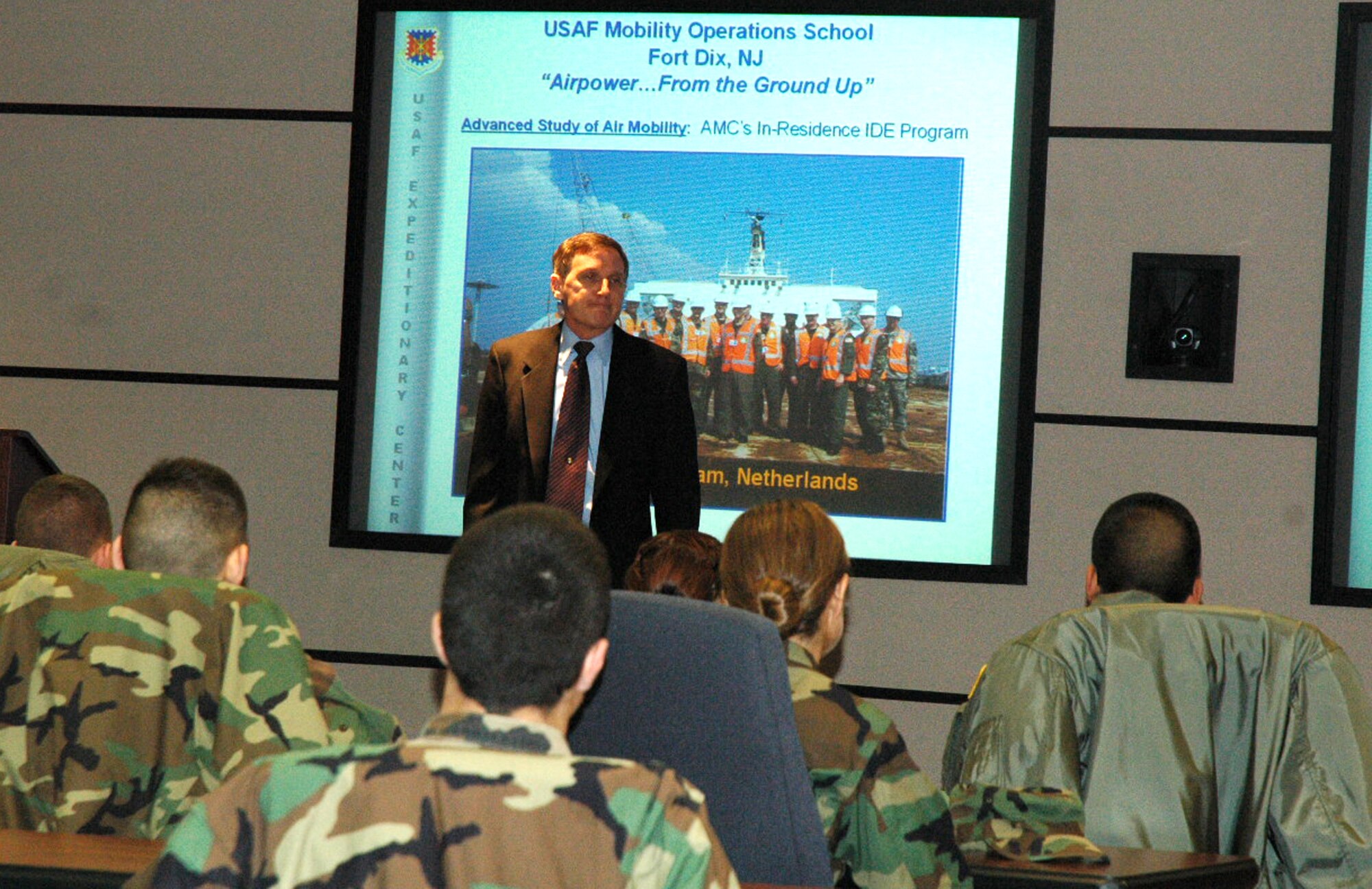 Mr. Rudy Becker, director of the U.S. Air Force Expeditionary Center's Mobility Operations School, talks to ROTC cadets from the Rennsselear Polytechnic Institute from New York during the cadet's tour of the Center Feb. 8, 2008, on Fort Dix, N.J.  More than 25 cadets and staff toured the USAF EC to learn more about the Center's expeditionary and mobility forces training for the Air Force.  (U.S. Air Force Photo/Tech./ Sgt. Scott T. Sturkol)