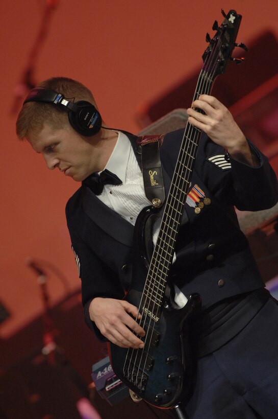 Tech. Sgt. Matthew Murray, U.S. Air Force Band, plays the bass during a performance at the Daughters of the American Revolution Constitution Hall in Washington Feb. 10. Sergeant Murray is a member of Silver Wings, the Band's country music component. The Band performed with the country music legend Restless Heart as part of its 2008 Guest Artist Series, which runs through March 2. (U.S Air Force photo by Senior Airman Tim Chacon)