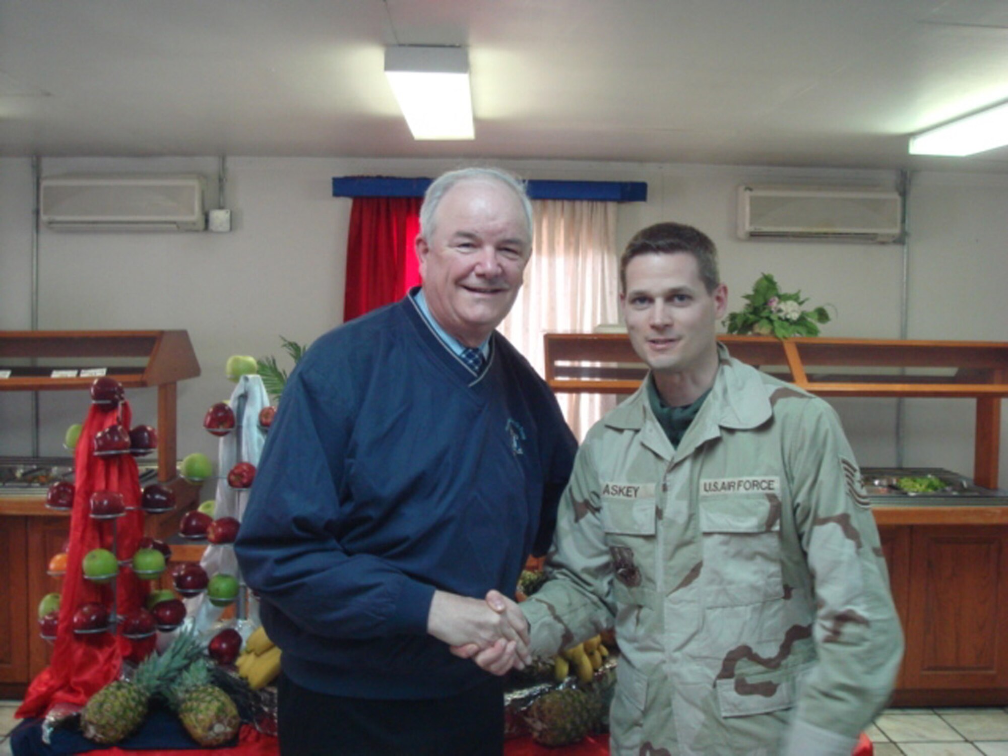 BAGRAM AIR BASE, Afghanistan – Tech. Sgt. Steven Askey, 455th Expeditionary Aircraft Maintenance Unit weapons expeditor, was selected to have lunch with Secretary of the Air Force Michael W. Wynne for his outstanding performance while deployed. Sergeant Askey is deployed from Spangdahlem Air Base, Germany. (Courtesy photo)