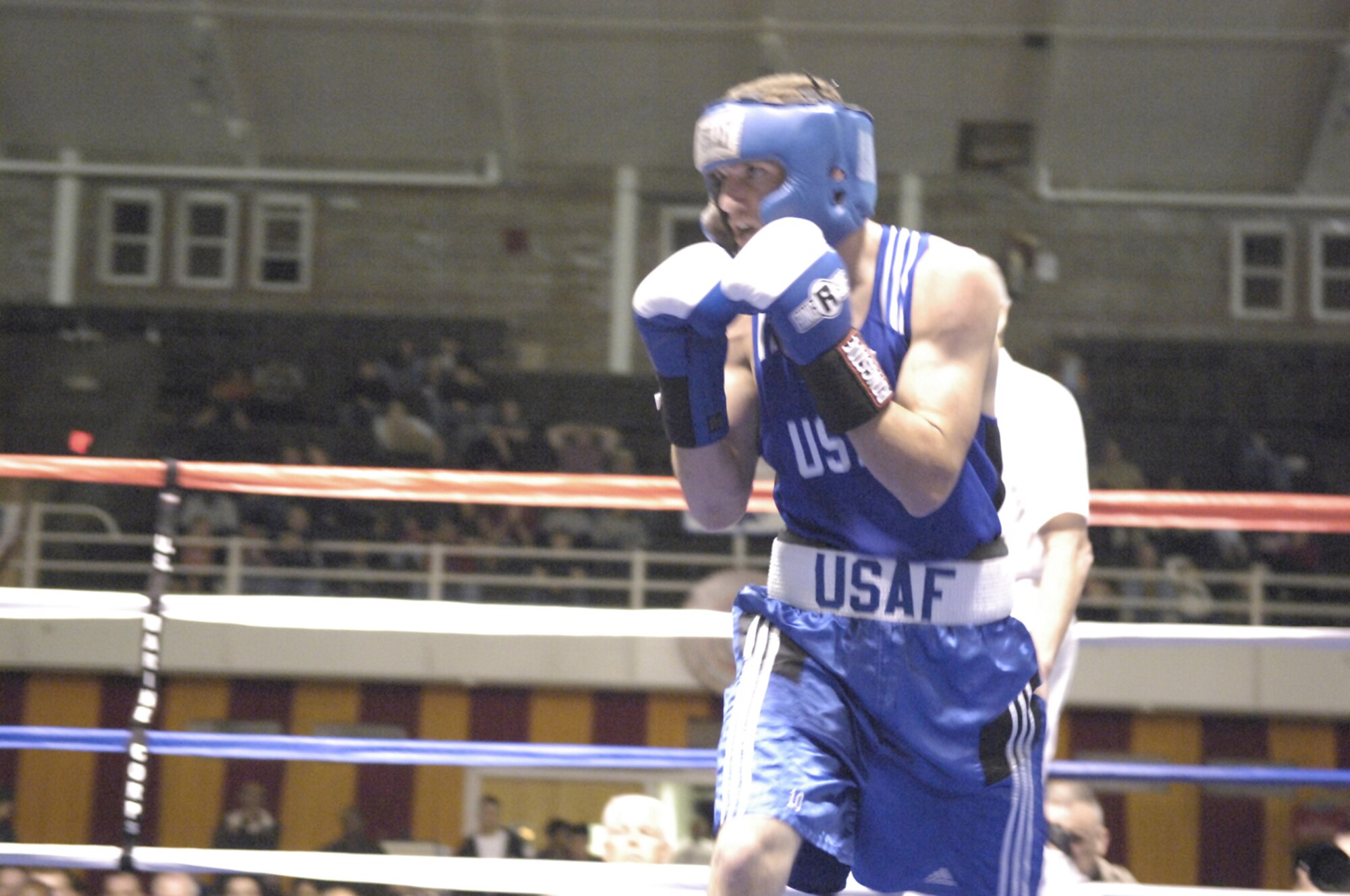 Airman 1st Class David Russell, 43rd Logistics Readiness Squadron, prepares to box in the finals of the 2008 Armed Forces Boxing Tournament Feb. 7 at Camp Lejeune, N.C. Airman Russell started boxing a little more than a year ago and recently earned a spot at 141 pounds on the Air Force Boxing Team. (U.S. Air Force photo by Staff Sgt. Jon LaDue)