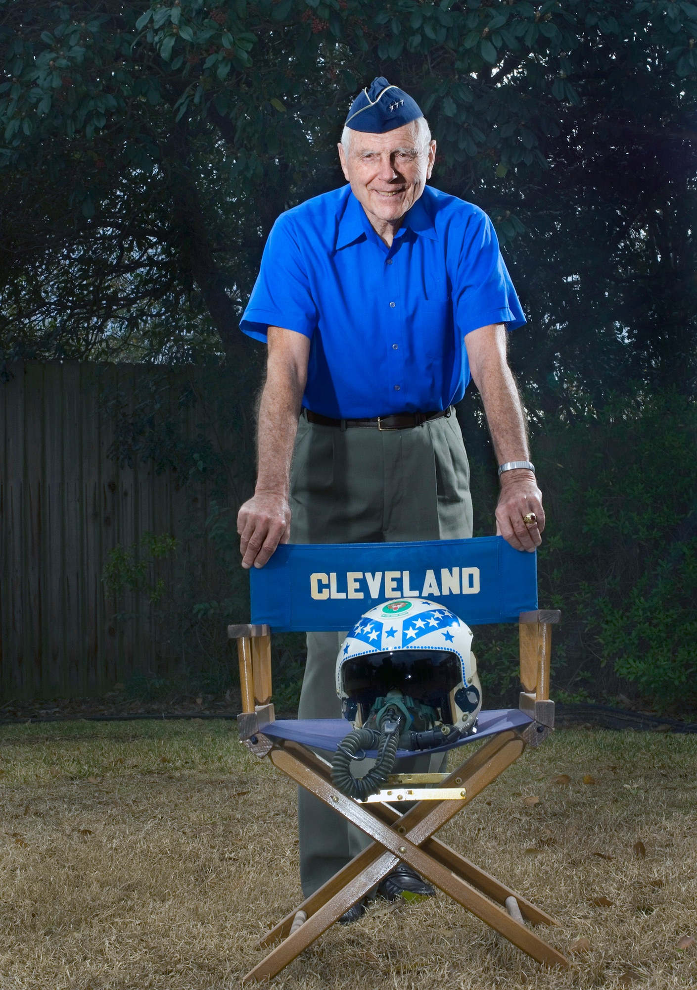 Retired Lt. Gen. Charles G. Cleveland stands in his backyard behind a director's chair presented to him as a gift for his time as the commander of the Air University at Maxwell Air Force Base, Ala. General Cleveland has been recognized by the Air Force as a jet fighter ace 55 years after the end of the Korean War. Newly discovered documentation by the Russian air force as well as eyewitness accounts by General Cleveland's wingmen proved evidence to support converting two probable kills into confirmed kills from dog fights over "Mig Alley" during the Korean War. General Cleveland was deployed to South Korea in March 1952, where he flew F-86s as a flight commander with the 4th Fighter Interceptor Wing at Kimpo Air Base. (U.S. Air Force photo/Staff Sgt. Bennie J. Davis III)
