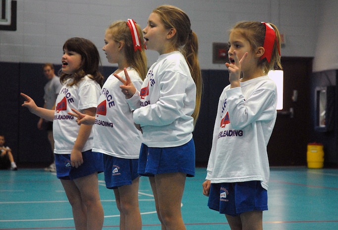 The Charleston Cheerleaders perform during the half-time break of the Charleston AFB 7- to 8-year-old game Saturday at the Youth Center. The Charleston Cheerleaders consist of 10 girls from ages 3 to 8. (U.S. Air Force photo/Master Sgt. Paul Kilgallon)