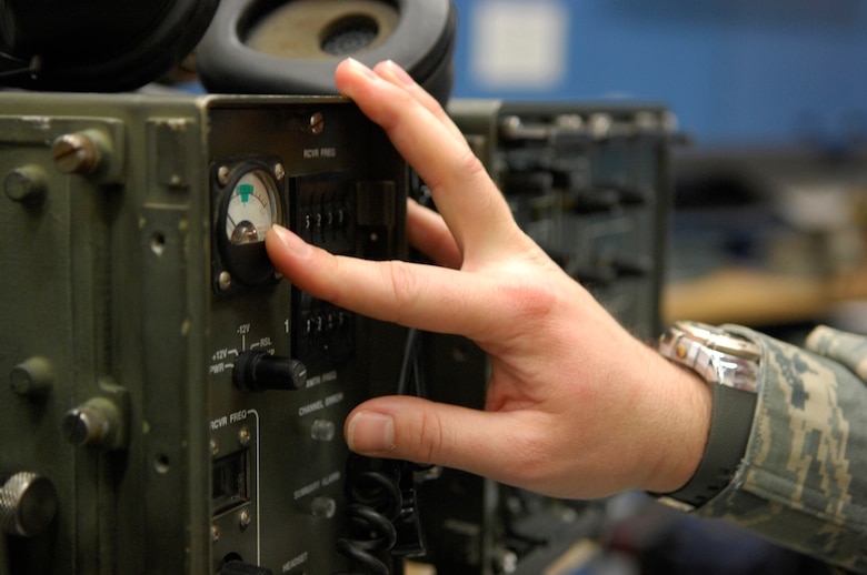 Technical Sgt. Jonathan Graham, 612th Air Communications Squadron quality assurance inspector, performs an inspection of Tropo Satellite Support Radio Feb. 5. (U.S. Air Force photo by Senior Airman Jesse Shipps)