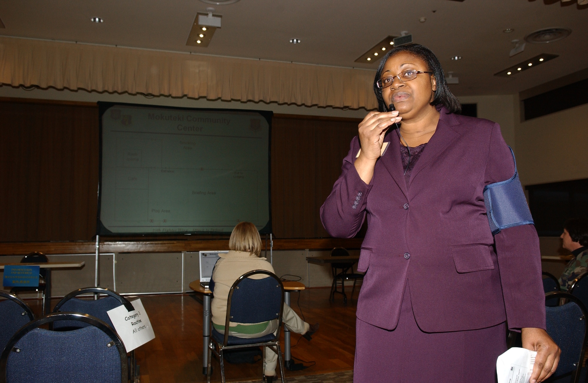 MISAWA AIR BASE, Japan -- Marjorie Pichon, Noncombatant Evacuation Operation commander, gives a briefing during the NEO as part of the Initial Readiness Response Exercise here on Feb. 12, 2008.  NEO is typically practiced every six months. (U.S. Air Force photo by Senior Airman Robert Barnett)