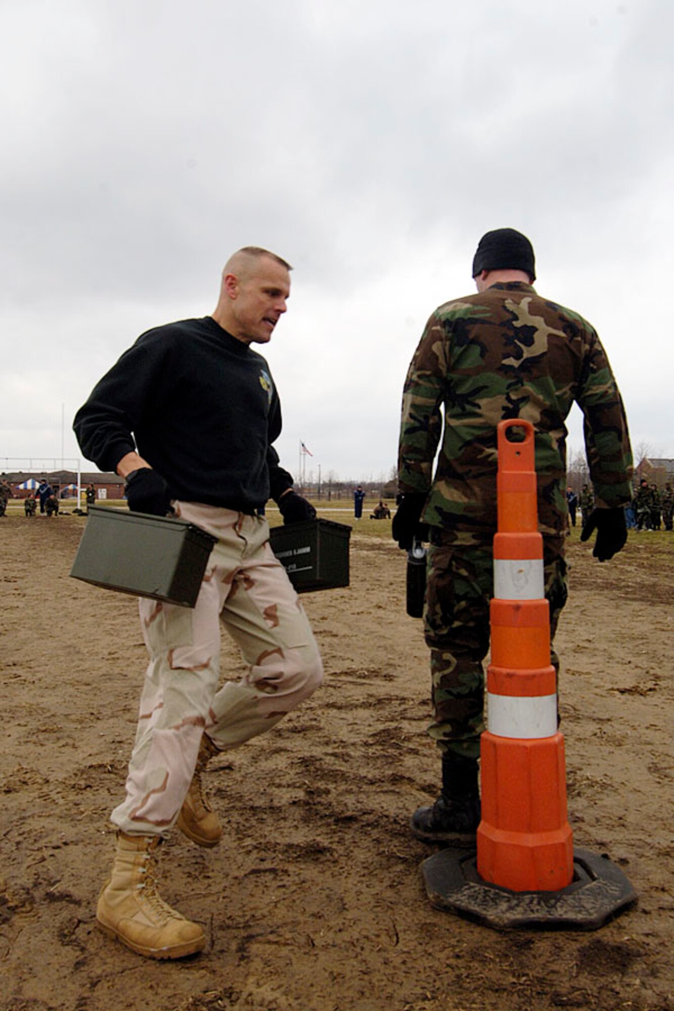 SCOTT AIR FORCE BASE, Ill. -- Col. Brad Spacy, 375th Mission Support Group commander, competes in the ammo can relay during the MSG Warfighter Day Feb 7. (U.S. Air Force photo/Senior Airman Jonathan Lovelady)