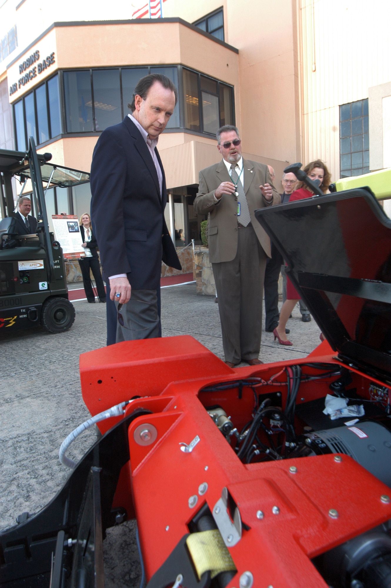 William C. Anderson, Assistant Secretary of the Air Force for installations, environment and logistics, gets a look at some of the alternative fuel vehicles at Robins Feb. 8. U. S. Air Force photo by Sue Sapp