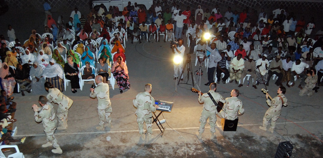 Members of The U.S. Air Force Band's ensemble Silver Wings perform at a community center in Nagad, Djibouti, this past October. Silver Wings participated in a 55-day deployment to six countries throughout Southwest Asia and Africa as part of the U.S. Central Command Air Forces' Expeditionary Band Live Round.
