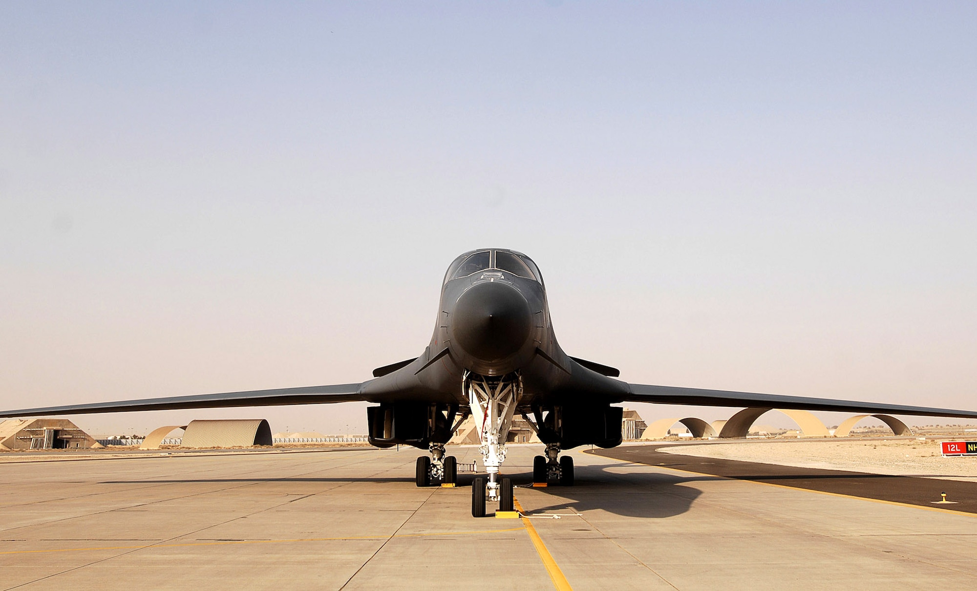 A B-1B Lancer stands by for its mission Feb. 12, at a Southwest Asia air base. One of the B-1B's missions is to provide close-air support for coalition forces throughout the area of responsibility as part of operations Enduring Freedom and Iraqi Freedom. (U.S. Air Force photo/Staff Sgt. Patrick Dixon)  
