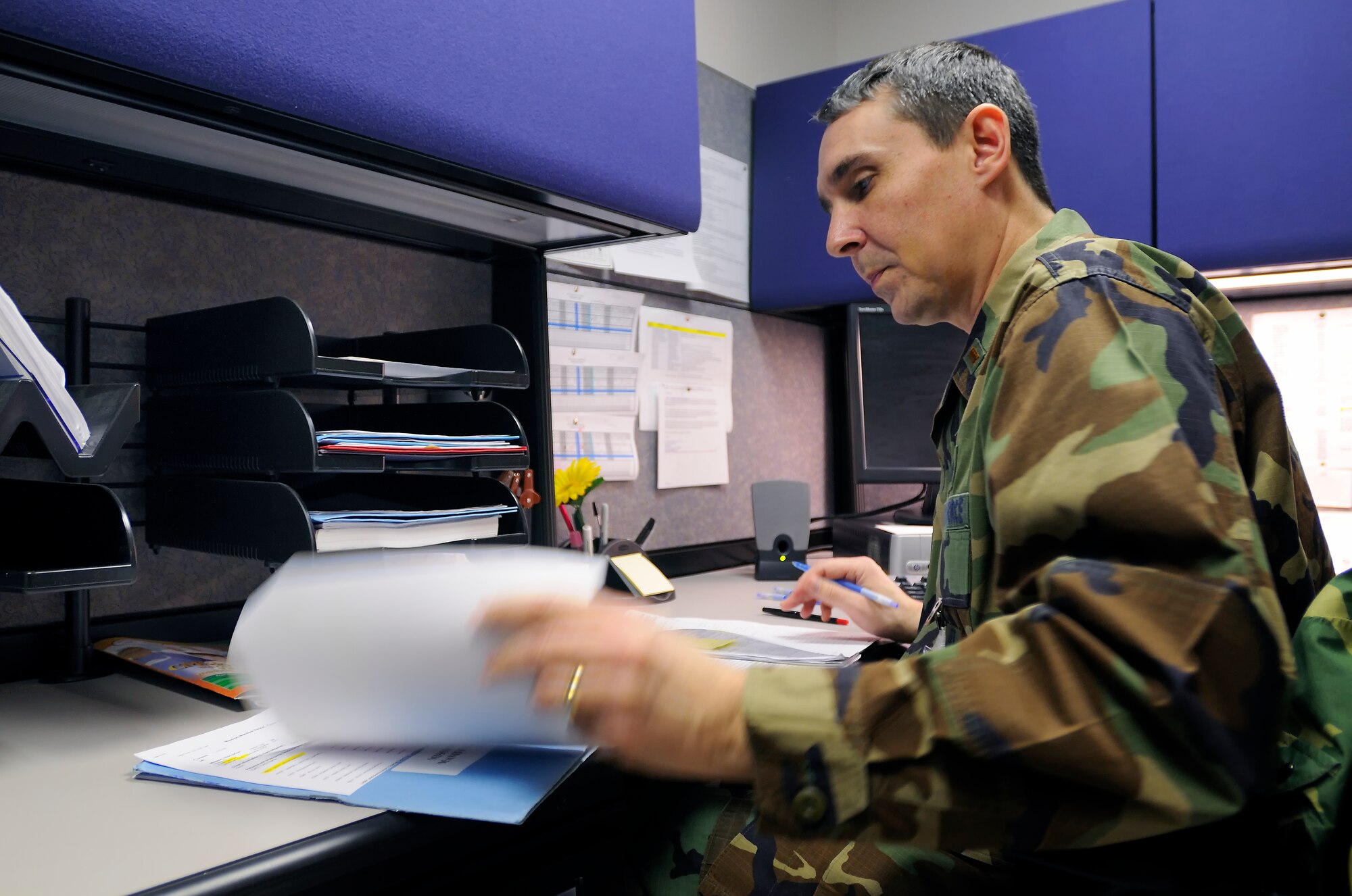 SCOTT AIR FORCE BASE, Ill. --  2nd Lt. Leonard McNeely, 375th Aeromedical Staging Facility charge nurse and mission officer in charge, annotates patients medical records Feb. 9 at Scott AFB, Ill. The 375th Airlift Wing located at Scott is one of three ASF distribution hubs in the continental United States that is responsible for transporting patients to their home bases or other specialized hospitals. (U.S. Air Force photo/Master Sgt. Maurice Hessel)