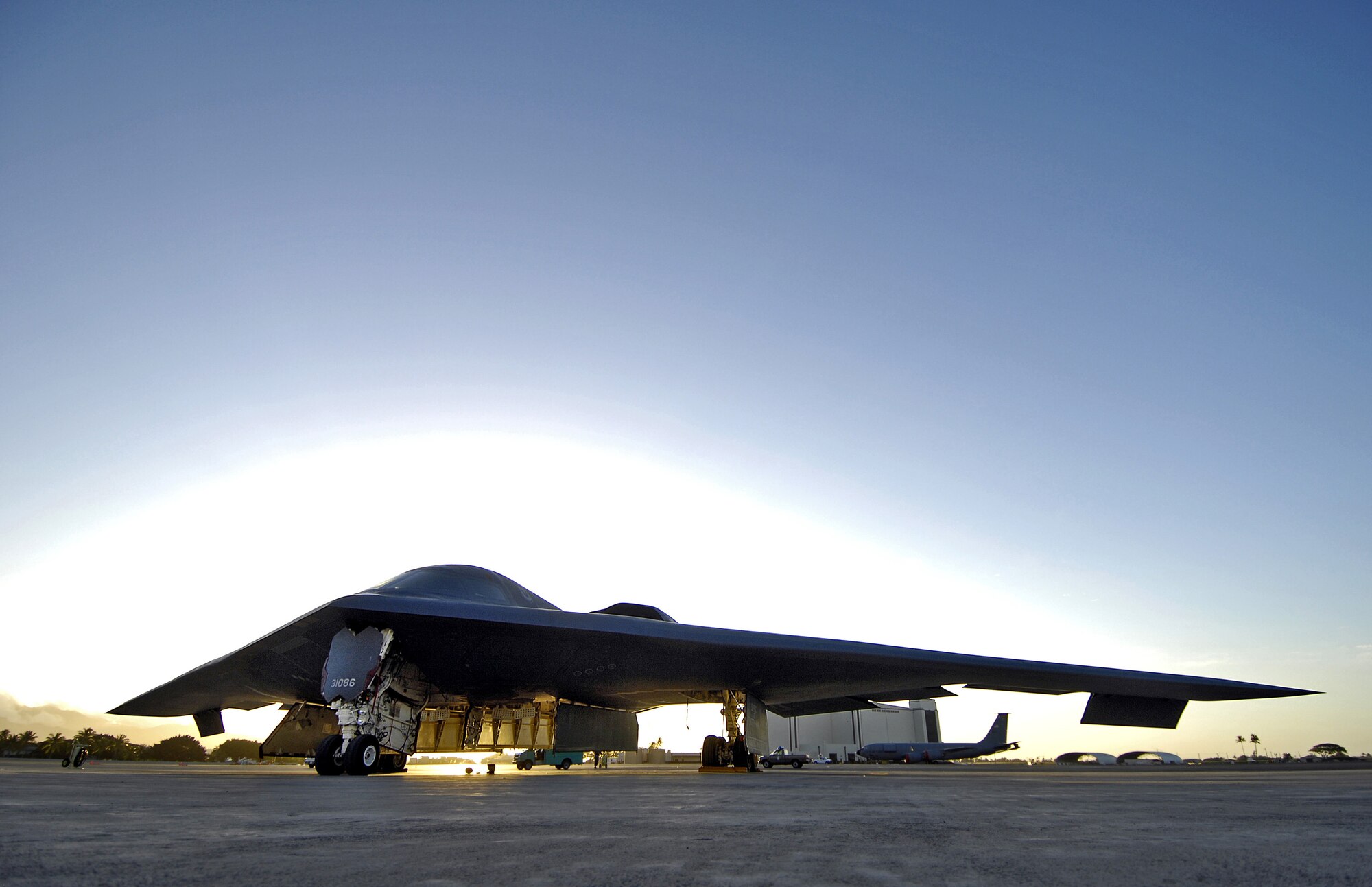 A B-2 Spirit stealth bomber sits at its parking spot on display Feb. 12, 2008 at Hickam Air Force Base, Hawaii. The B-2 on display is one of four bombers currently deployed to Andersen Air Force Base, Guam, as part of U.S. Pacific Command’s continuous bomber presence. The aircraft and approximately 280 aircrew and support personnel from the 509th Bomb Wing at Whiteman Air Force Base, Mo., have been in theater since Oct. 5. (U.S. Air Force photo/Tech. Sgt. Shane A. Cuomo)