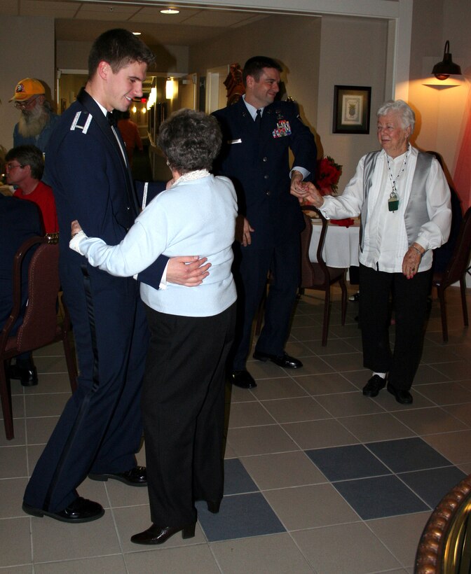 Airmen from nearby Hurlburt Field and Eglin Air Force Base joined residents at the Air Force Enlisted Village's Hawthorn House in Shalimar, Fla., Feb. 9 for their Valentine's Day Ball.  Hawthorn House is the AFEV's assisted living residence.  The ball included dinner and a dance.  (U.S. Air Force photo/Jodi L. Jordan)