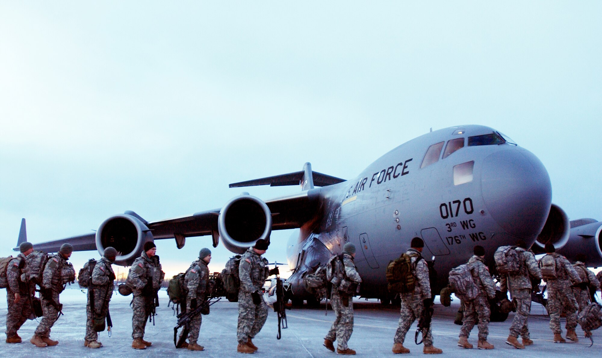 Members of the Army's First Stryker Brigade Combat Team of the 25th Infantry Division, 1st Battalion 24th Infantry Regiment, Charlie Company from Fort Wainwright, Alaska boards a C-17 Globemaster III for their departure for their deployment to the Republic of Korea in support of the Foal Eagle exercise.  It is the first time the USAF and US Army in Alaska has used joint assets to project combat power protection out of Alaska. The C-17 Globemaster III and its crew members are from the 517th Airlift Squadron, Elmendorf AFB, Alaska.

(U.S Air Force photo by: Staff Sgt Eric T. Sheler)
