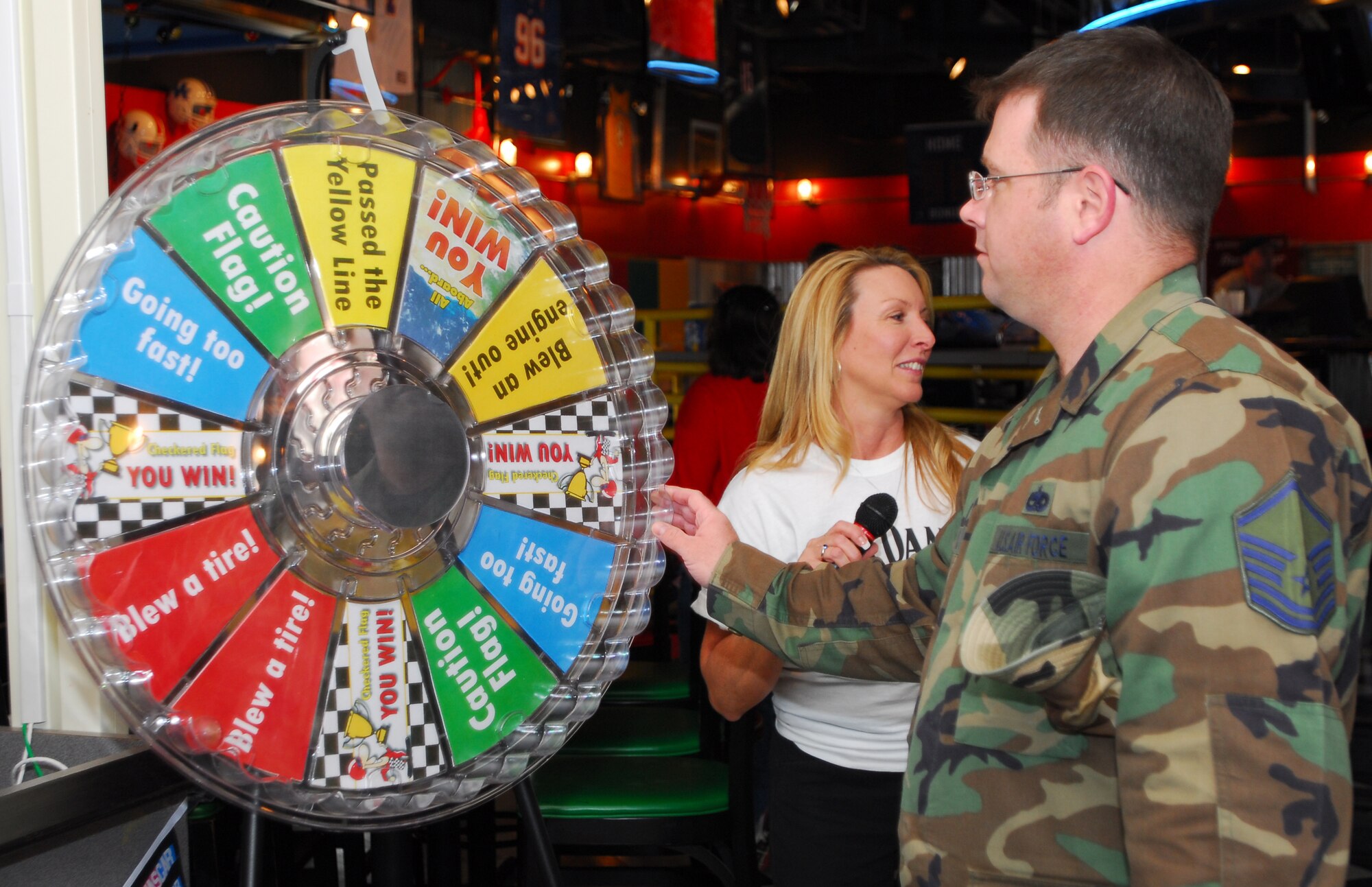 A master sergeant spins the prize wheel Feb. 13 at the 2008 Travel Expo at J.R. Rockers. More than 700 people attended the event which featured more than 60 vendors from various hotels, theme parks and other travel attractions. Lucky attendees walked away with a total of $8,500 in door prizes including a cruise. (U.S. Air Force photo/Airman 1st Class Jason Epley)
