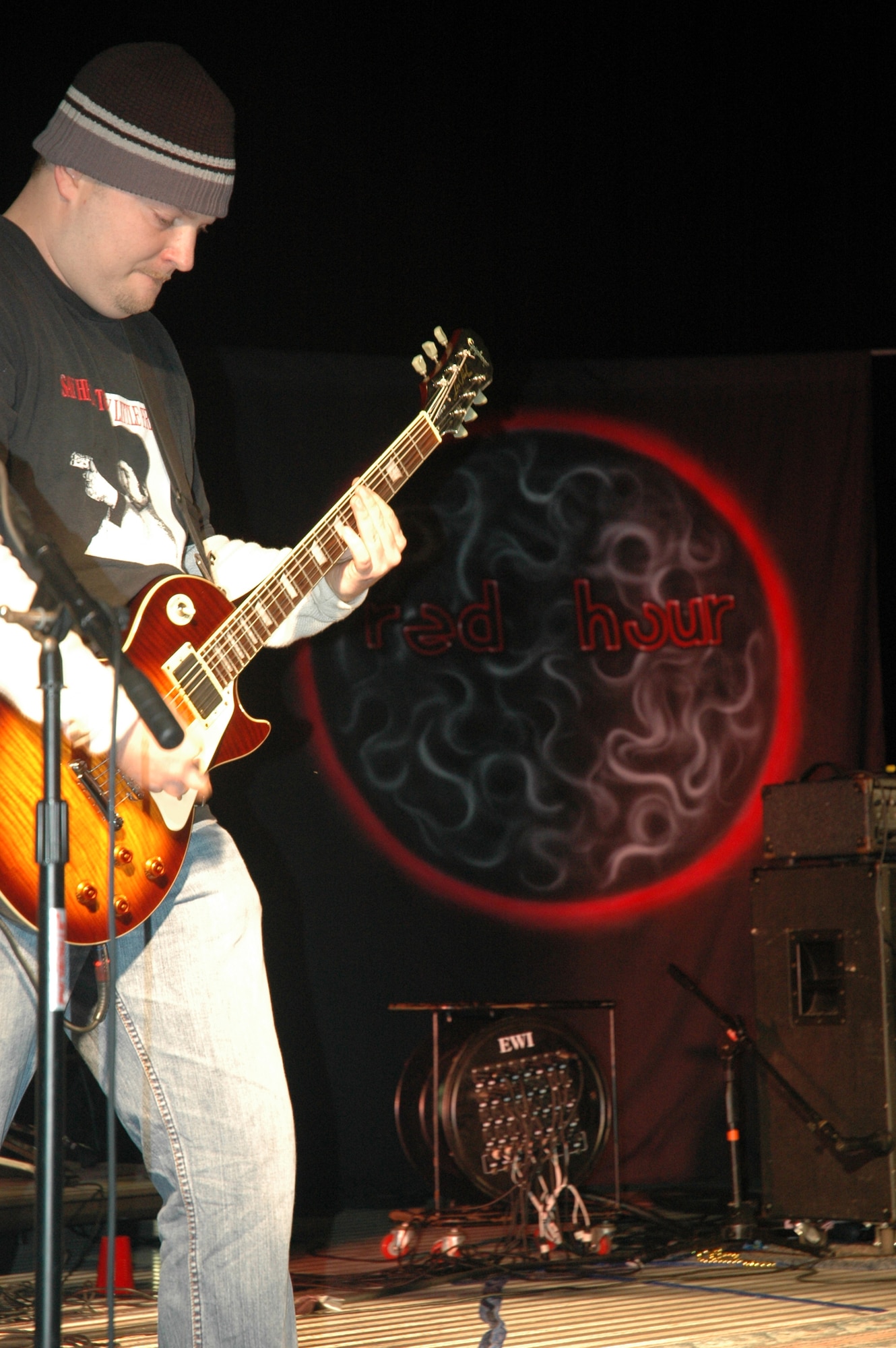 Chris Dahmer, member of the local band Red Hour and the 325th Fighter Wing Public Affairs office, plays his guitar during Rockfest 2008 Saturday.  Red Hour was just one of ten local bands to come out to Tyndall Air Force Base to perform.  (photo by Airman 1st Class Anthony J. Hyatt)