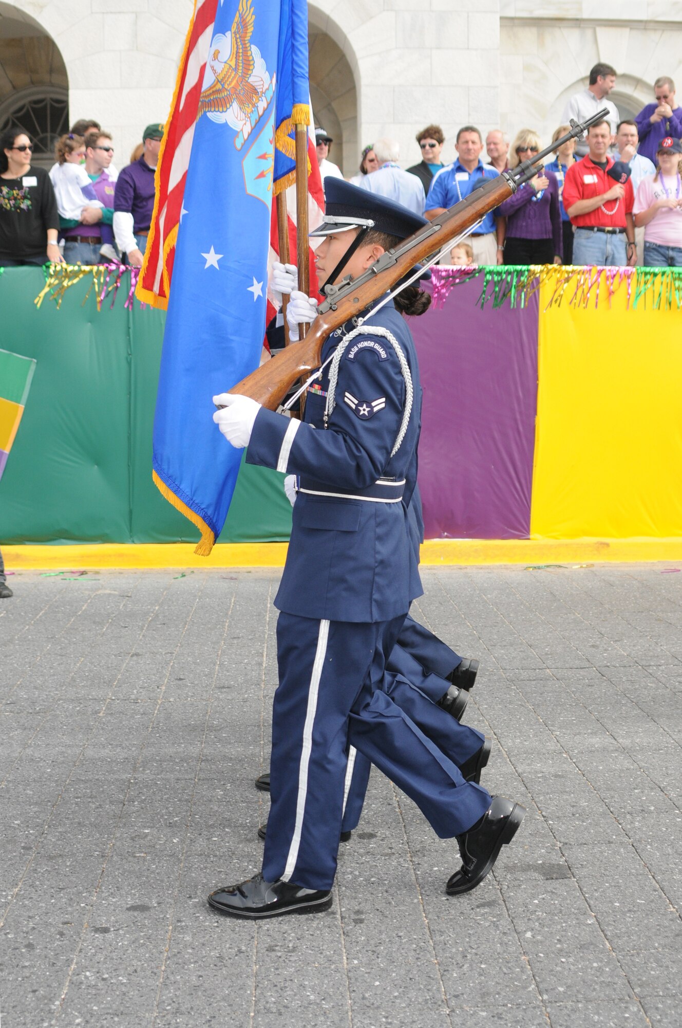 The Keesler Honor Guard leads the Gulf Coast Carnival Association Mardi Gras parade in Biloxi Feb. 5.  (U.S. Air Force photo by Kemberly Groue)