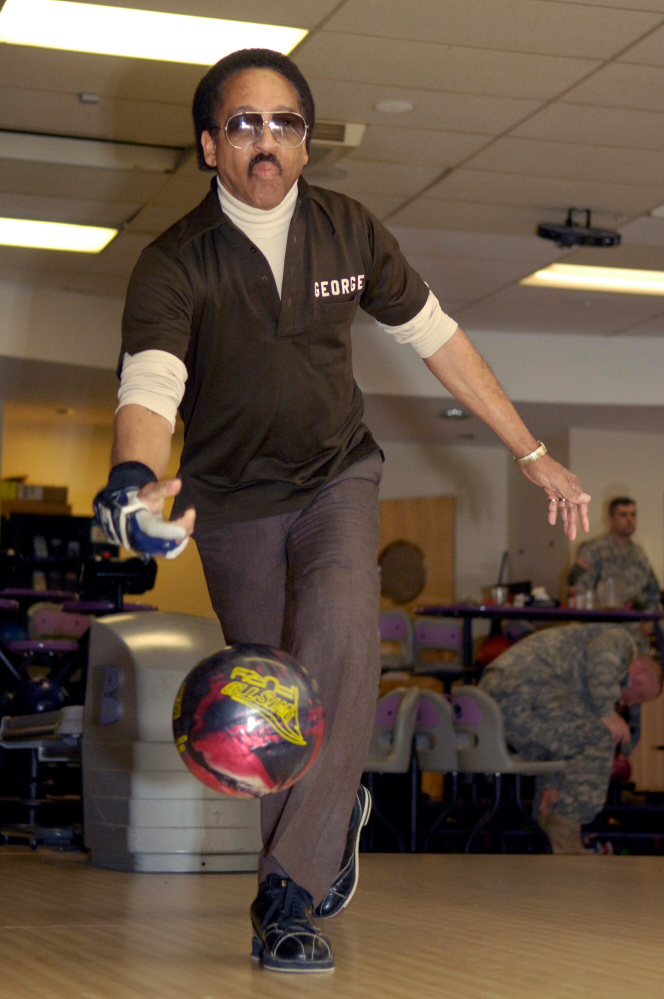 HANSCOM AFB, Mass. – George Jones, an avid bowler of over 50 years, recently bowled a perfect 300 game at Hanscom Lanes during league play. This is the ninth perfect game for Mr. Jones, who bowls with the Sullivan Classic league at Hanscom. Mr. Jones who retired from the military after a combined 35 years with the Air Force and Army National Guard has been bowling since he was eight years old and has no plans on stopping any time soon. (U.S. Air Force photo by Mark Wyatt)