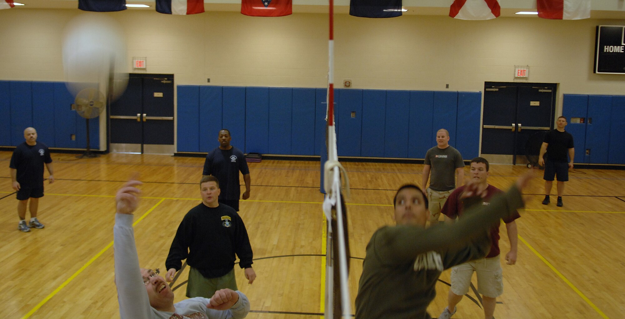 MOODY AIR FORCE BASE, Ga. -- Master Sgt. Robert Scheiterle, 824th Security Forces Squadron acting first sergeant, attempts to hit a volleyball over the net during a Chiefs and First Sergeants vs. Airman Leadsership Class 08-B volleyball game Feb. 13 here. The chiefs and first sergeants stomped the Airman, winning four out of four games. (U.S. Air Force photo by Airman 1st Class Brittany Barker)