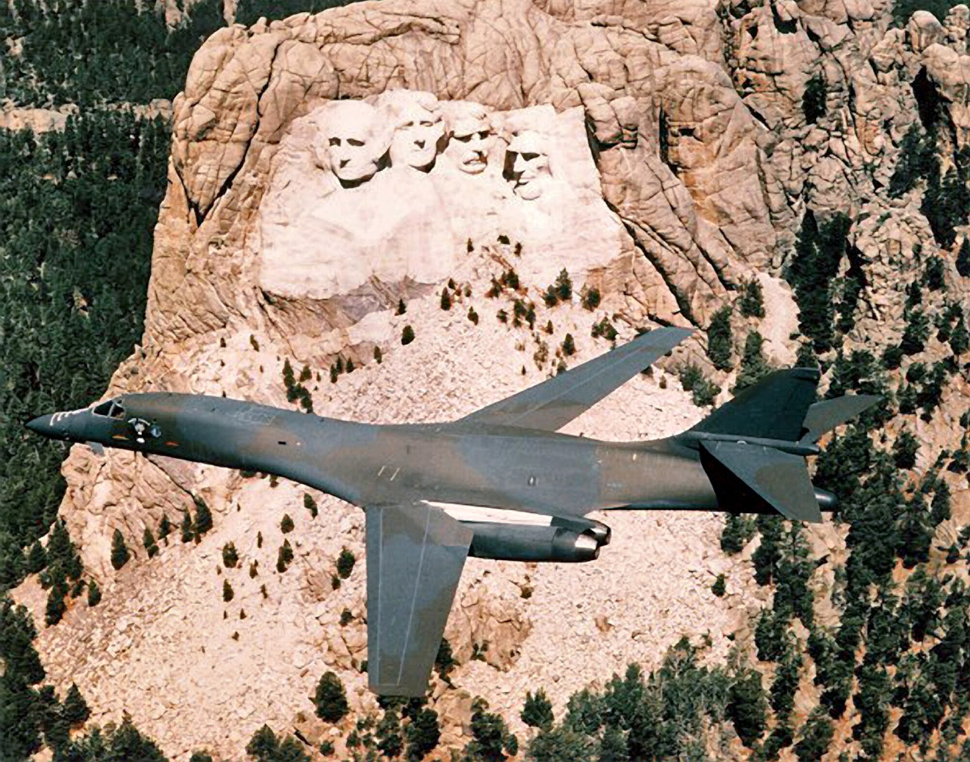 A B-1B Lancer flies past the Mount Rushmore National Memorial near Keystone, S.D.  The monument features presidents Washington, Jefferson, Roosevelt and Lincoln.  President's Day is a federal holiday in the U.S. and is celebrated on the third Monday of February.  (Courtesy Photo)