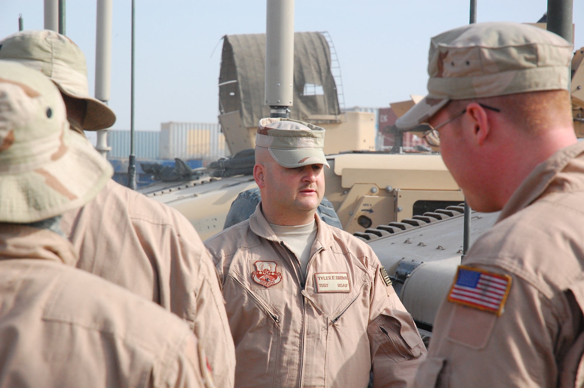 CAMP BUCCA, Iraq -- Tech. Sgt. Tyler Brown briefs his squad on potential dangers before conducting outside the wire security operations Feb. 11, 2008. Sergeant Brown is deployed with the 887th Expeditionary Security Forces Squadron, which conducts combat patrols to deter local insurgents from attacking Camp Bucca. The combat patrols include looking for improvised explosive devices and gathering intelligence by directly engaging Iraqis in the local communities.  The squadron is the only U.S. defense force that provides continual patrols outside the wire in southeast Iraq. (U.S. Air Force Photo/Capt. Jason McCree)