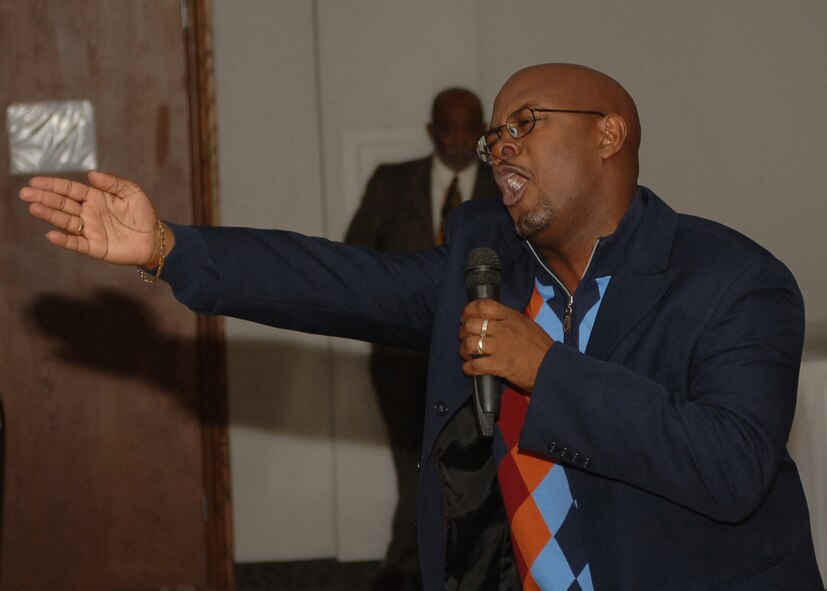 DYESS AIR FORCE BASE, Texas-- Sammy Davis, 7th Comptroller Squadron, amazes the audience with his awesome vocal skills which led to his victory at the Dyess Idol Competition Feb. 9. Mr. Davis sang Here and Now and Stand. (U.S Air Force photo by Airman 1st Class Felicia Juenke)