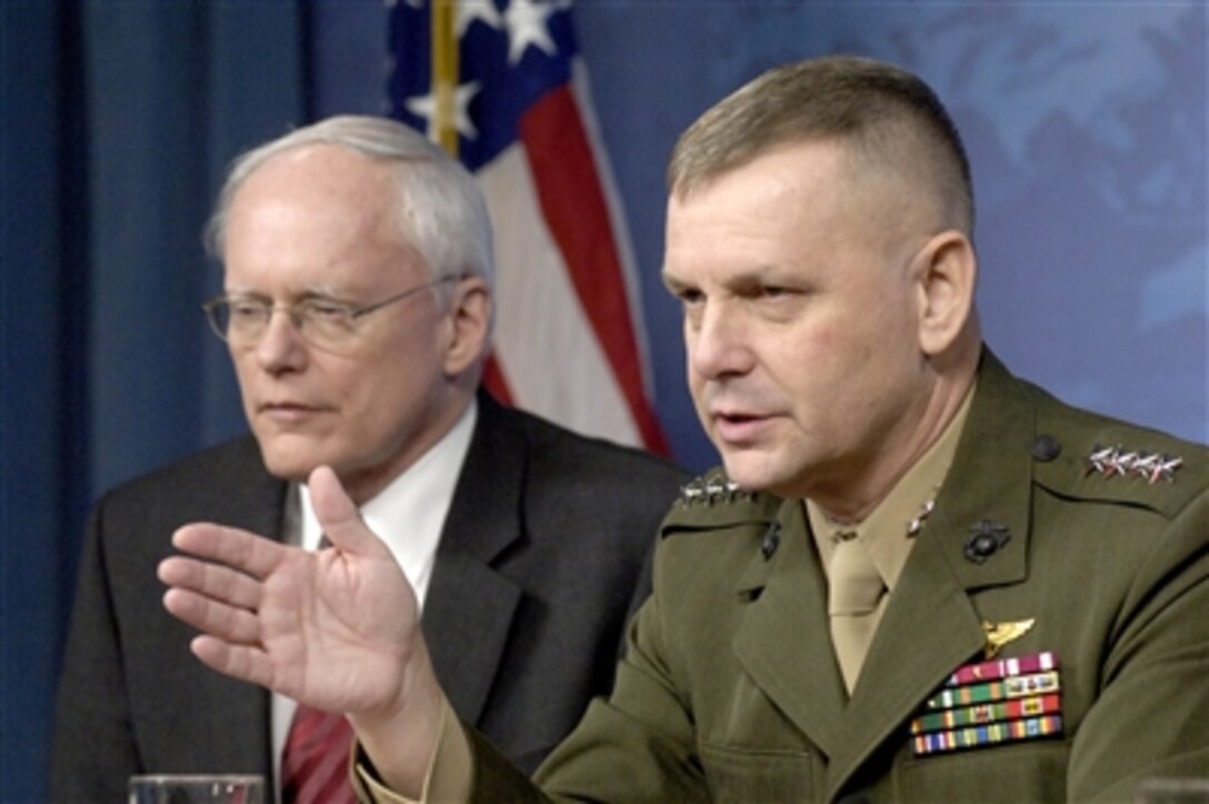 Vice Chairman of the Joint Chiefs of Staff Gen. James Cartwright, U.S. Marine Corps, talks about plans to destroy an unresponsive U.S. reconnaissance satellite with an interceptor missile during a Pentagon press briefing on Feb. 14, 2008.  The 5000 lb. satellite would pose a possible risk to life if allowed to fall to Earth due to the large quantity of dangerous hydrazine rocket fuel onboard.  Cartwright was accompanied by Assistant to the President and Deputy National Security Advisor Ambassador James Jeffries (left) and NASA Administrator Michael Griffin.  