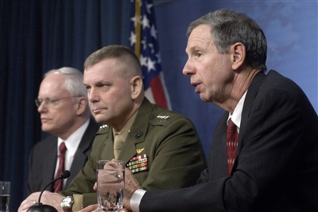 Administrator of the National Aeronautics and Space Administration Michael Griffin (right) comments on the proposed plan to destroy an unresponsive U.S. reconnaissance satellite with an interceptor missile as it enters the Earth's atmosphere during a press briefing in the Pentagon on Feb. 14, 2008.  Griffin, Vice Chairman of the Joint Chiefs of Staff Gen. James Cartwright (center), U.S. Marine Corps, and Assistant to the President and Deputy National Security Advisor Ambassador James Jeffries (left) discussed details of the planned operation.  