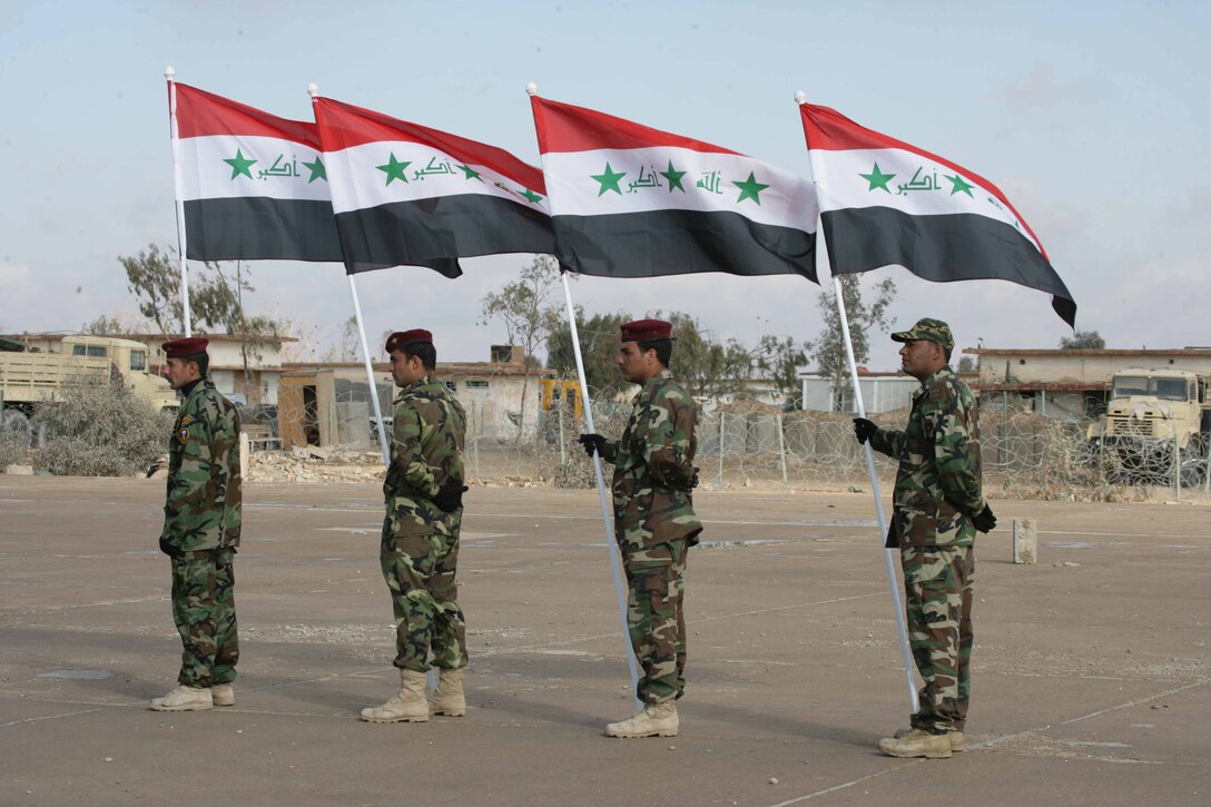 Iraqi soldiers with 2nd Regiment, 2nd Brigade, 1st Division, practice marching for their graduation ceremony aboard the Iraqi Training Center in Al Anbar province, Iraq on February 15, 2008. The Iraqis are trained by U.S. Marine Military Transition Team, 2nd Battalion, Regimental Combat Team 1, to operate in the Northern part of Iraq. RCT-1 is deployed with Multi National Force-West in support of Operation Iraqi Freedom in the Al Anbar province of Iraq to develop Iraqi Security Forces, facilitate the development of official rule of law through democratic reforms, and continue the development of a market based economy centered on Iraqi reconstruction.