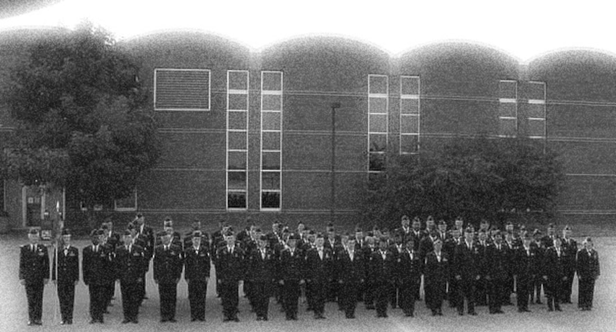 Looking proud to be in the Air Force Reserve!  An open ranks inspection was done on a summer day in 2002 by the commander of the 932nd Airlift Wing back then, Col. Oral Carper.  Assisting were the commander of the Medical Group, Col. Roger Wujek, and the 932nd Airlift Wing Command Chief Master Sgt. Merle Lyman.  Artwork rendering from 932 AW/PA.