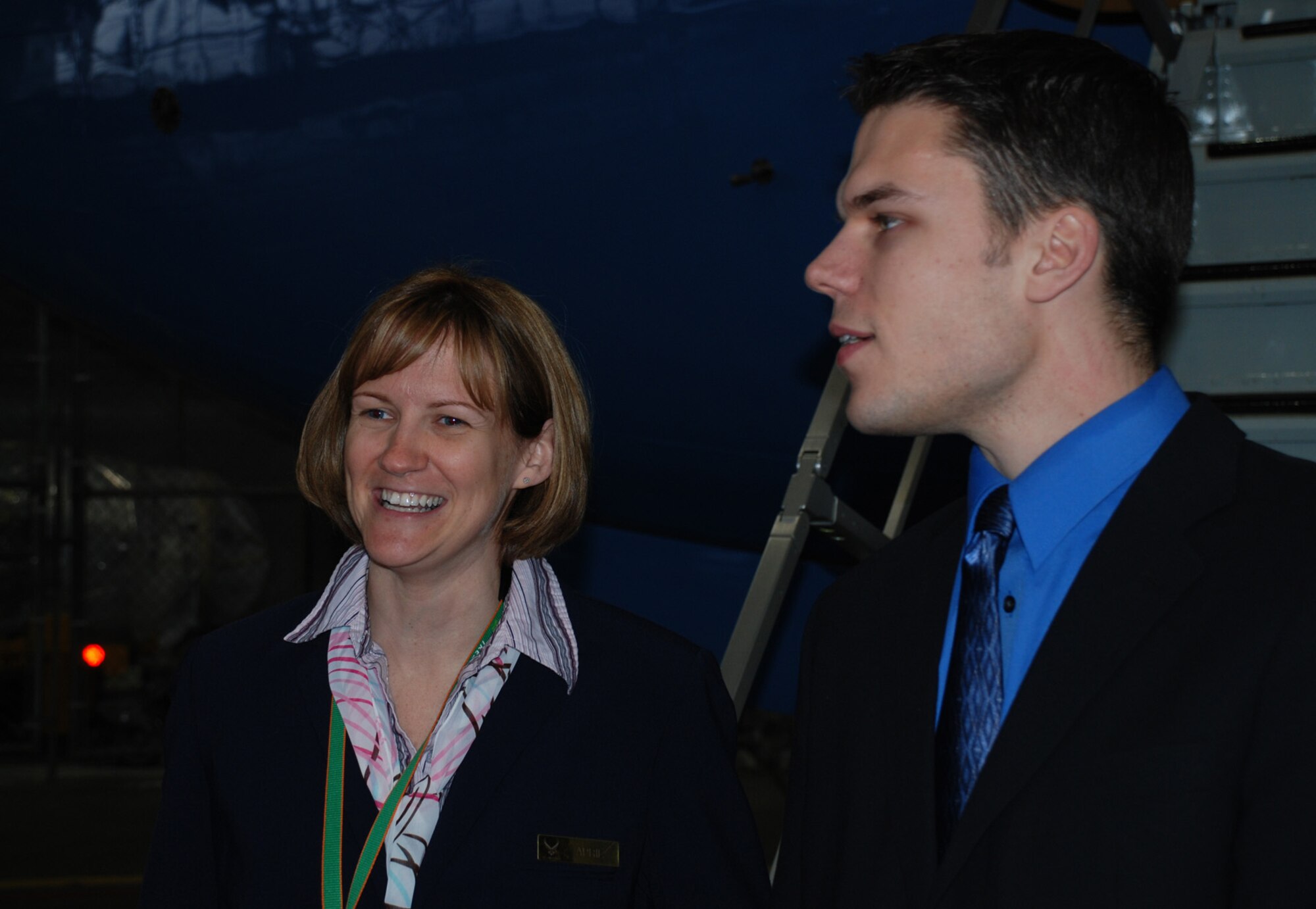 Tech. Sgt. April Tarbill and Senior Airman Bob Fourman, both flight attendants with the 73rd Airlift Squadron, 932nd Airlift Wing, share their enthusiasm as they speak to other Air Force Airmen about opportunities in the Air Force Reserve Command flight attendant program.