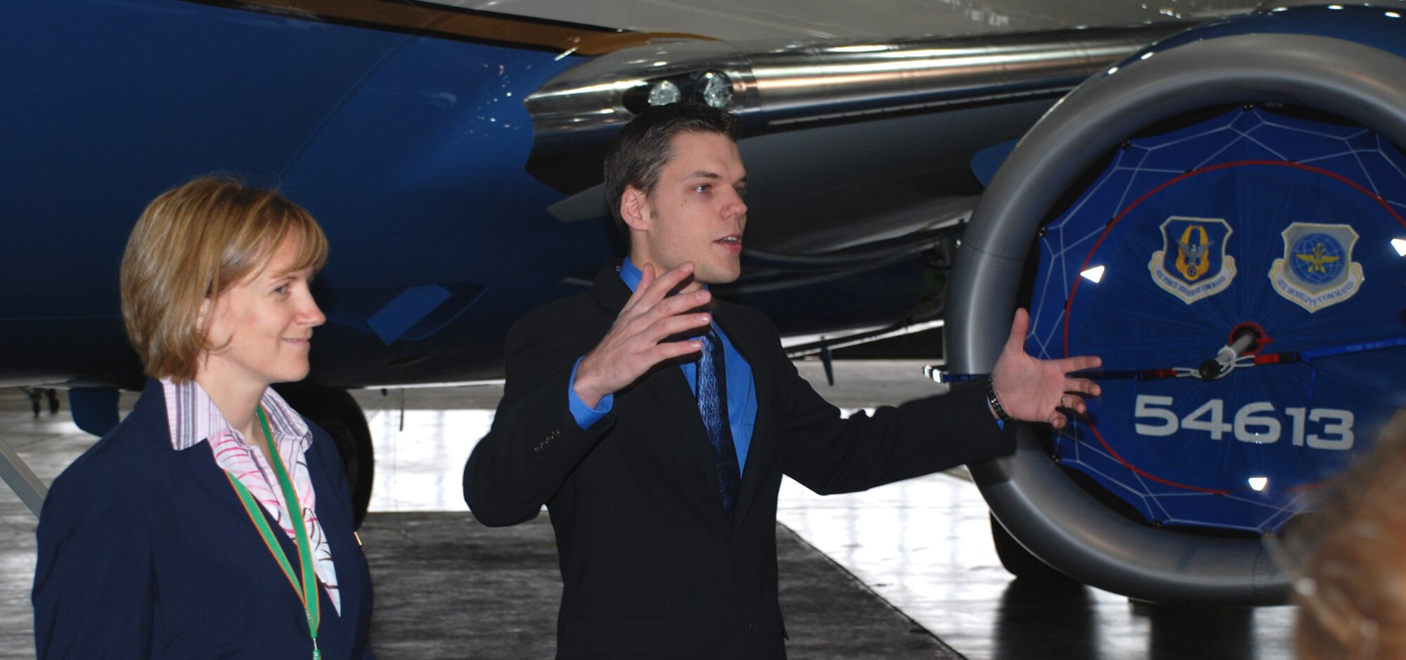 Tech. Sgt. April Tarbill and Senior Airman Bob Fourman, both flight attendants with the 73rd Airlift Squadron, 932nd Airlift Wing, speak to other Air Force Airmen about their memories of training and the opportunities in the Air Force Reserve Command flight attendant program.
