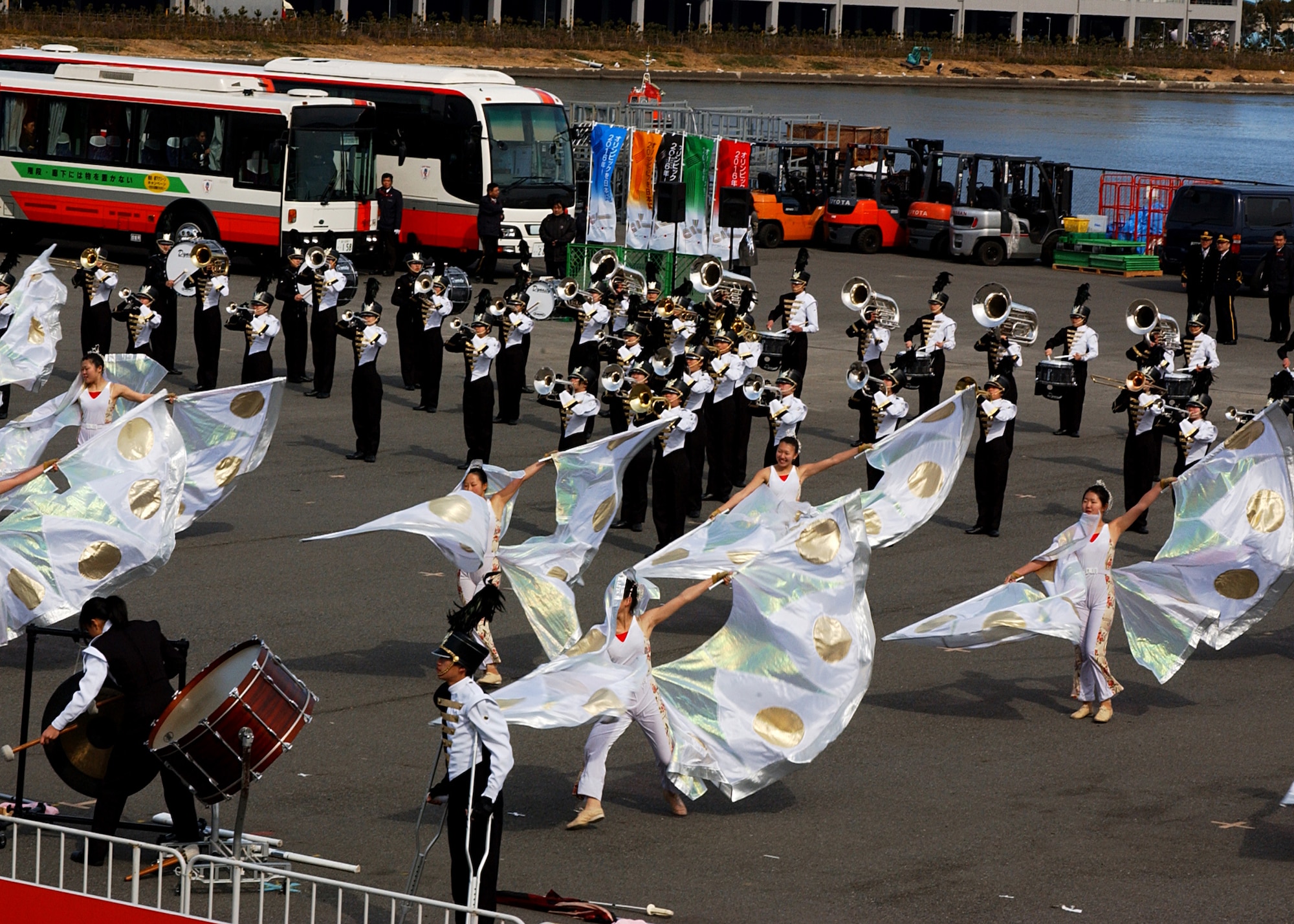 TOKYO, Japan-- A marching band and dance group perform at the finish line of the Tokyo Marathon on Feb. 17. Many groups performed during the marathon to support for runners and entertain visitors. (U.S. Air Force photo by Airman 1st Class Jonathan Fowler)                                  