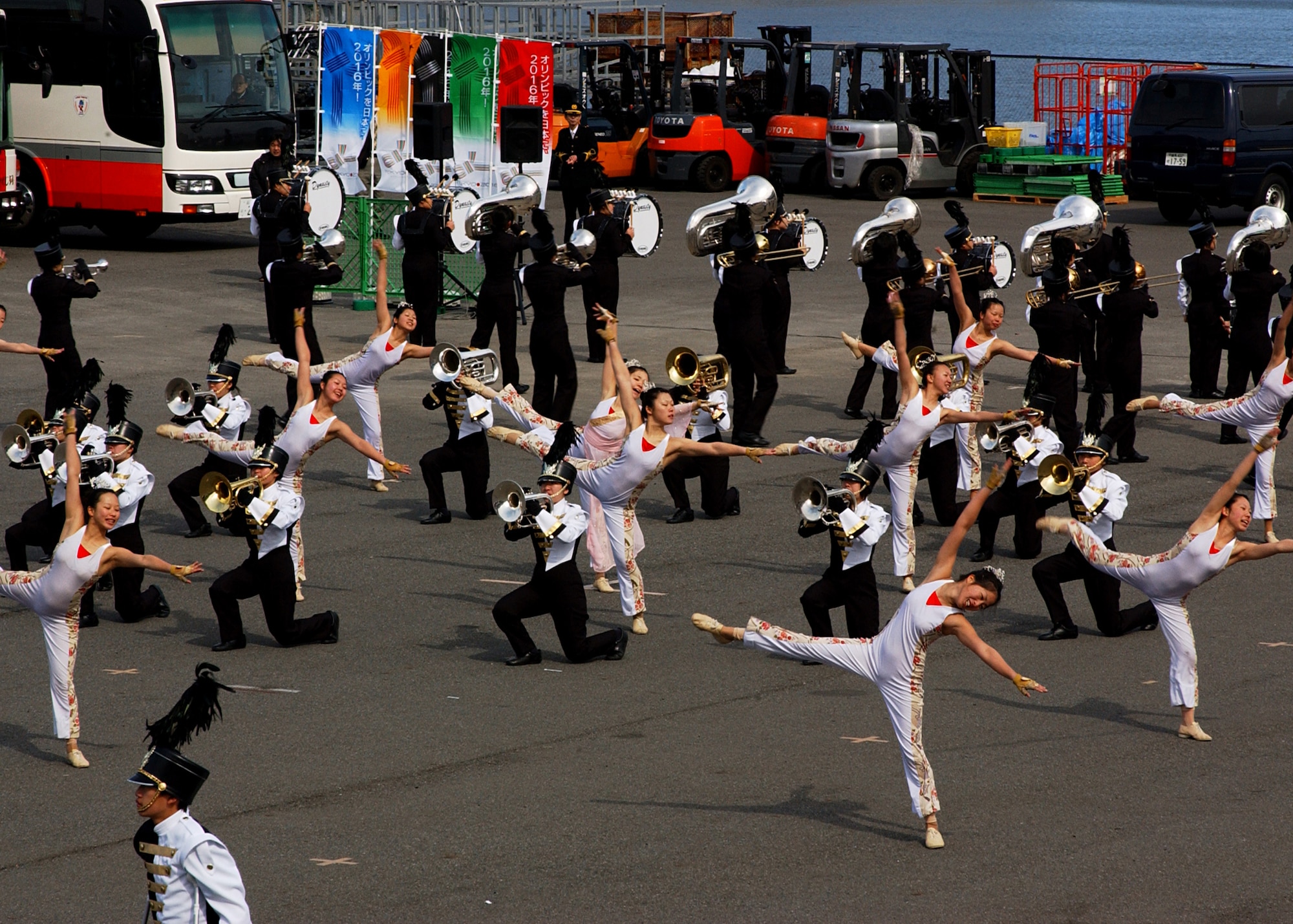 TOKYO, Japan-- A marching band and dance group perform at the finish line of the Tokyo Marathon on Feb. 17. Many groups performed during the marathon to support for runners and entertain visitors. (U.S. Air Force photo by Airman 1st Class Jonathan Fowler)                                                  