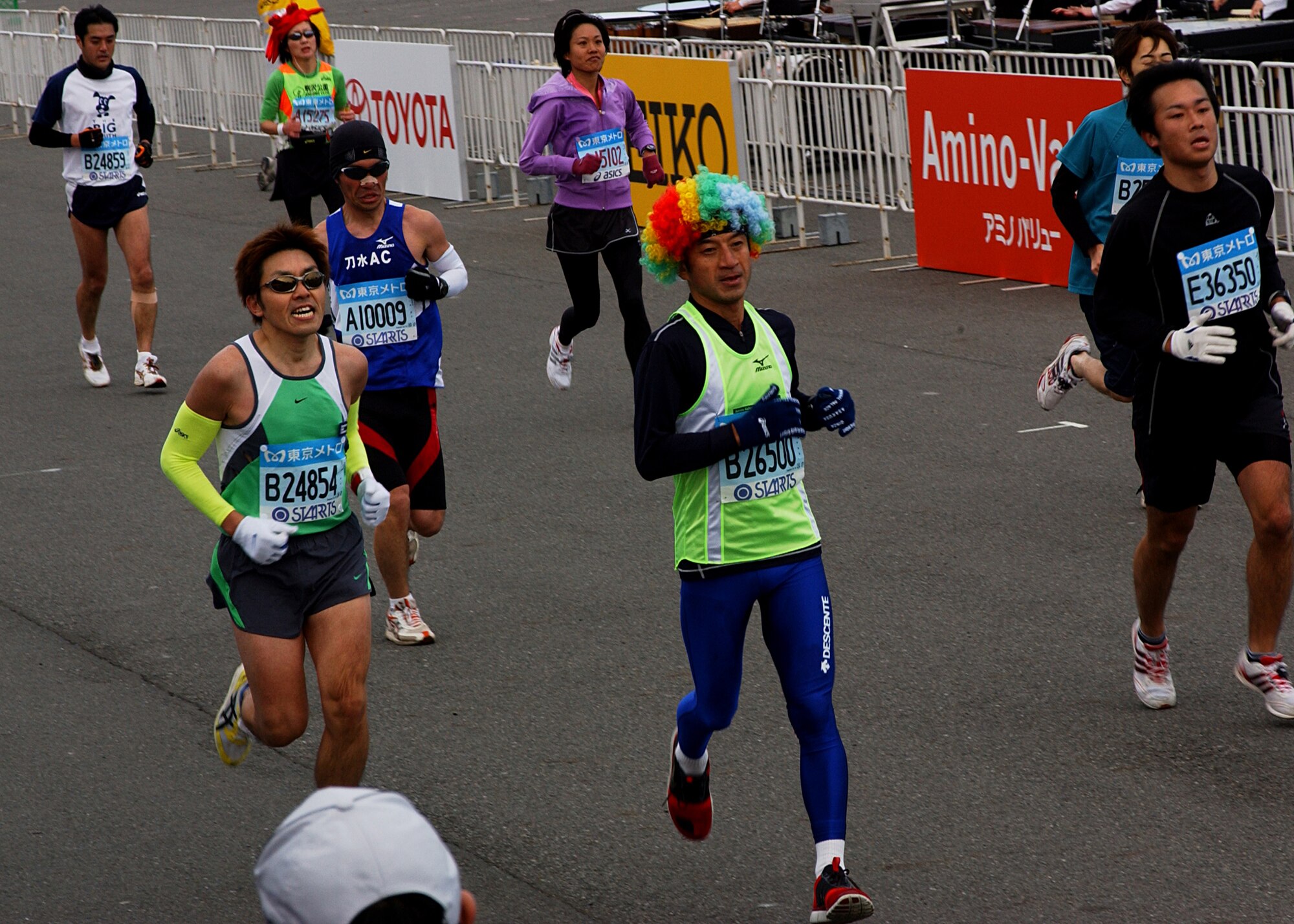 TOKYO, Japan-- Runners finish the final stretch of the Tokyo Marathon on Feb. 17. About 30,000 people participated in the event, including about 40 people from Yokota Air Base, Japan.  Some participants chose to run the entire 26 miles dressed as various characters such as clowns, superheroes and cartoon characters. (U.S. Air Force photo by Airman 1st Class Jonathan Fowler)           