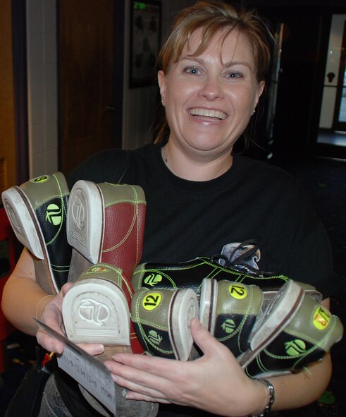 Shoes and smiles at the 932nd bowling tourney.