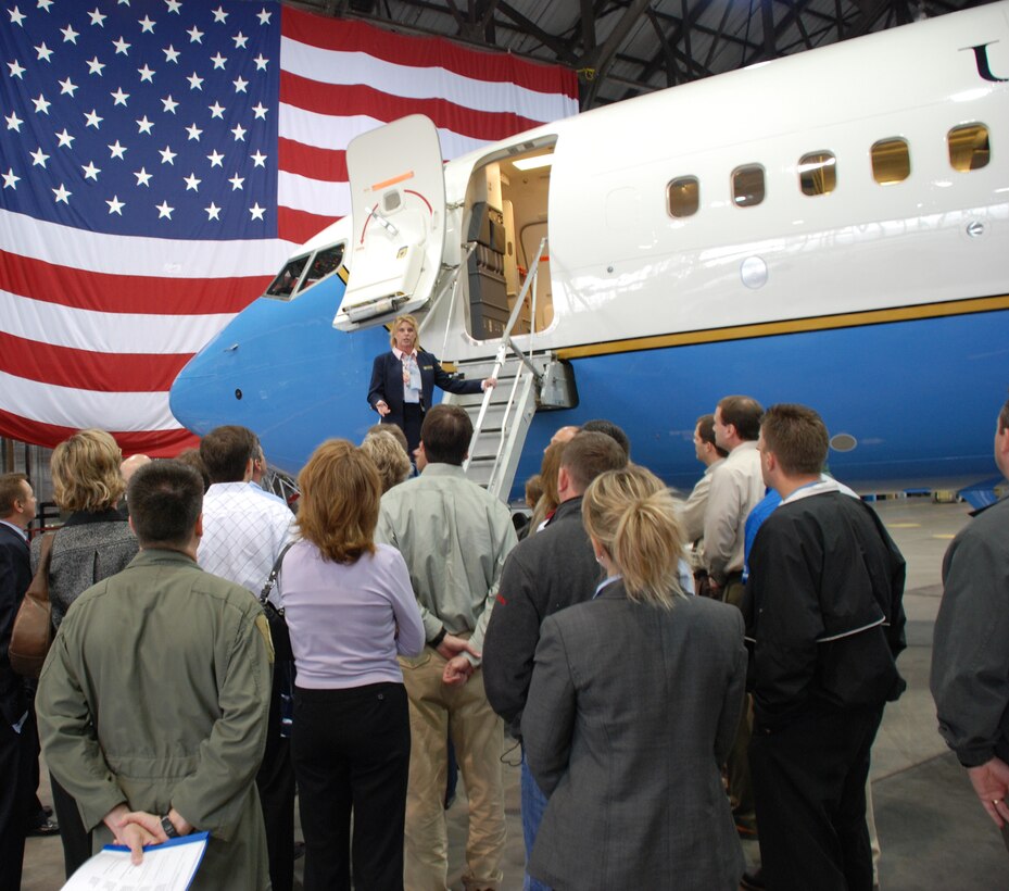 Staff Sergeant Kristen Phillips, a flight attendant with the 73rd Airlift Squadron, 932nd Airlift Wing, walks the steps of a C-40C plane belonging to the 932nd Airlift Wing.  There are opportunities in the Air Force Reserve Command's 932nd Airlift Wing flight attendant program. Military members must have a five level and qualify for a top secret clearance. For more information on the Air Force Reserve, call 1-800-257-1212. Photo/Capt. Stan Paregien  