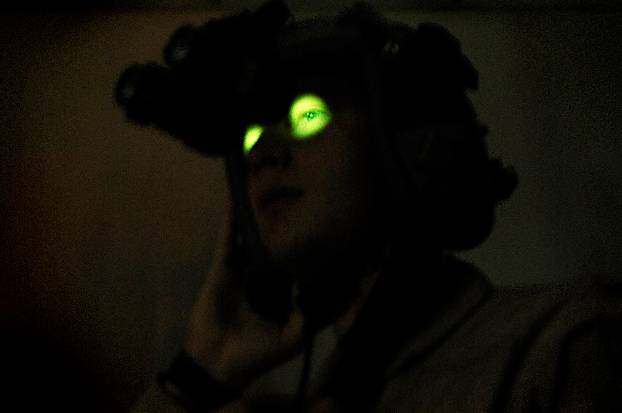 SOUTHWEST ASIA -- First Lt. David Hale, a C-130 Hercules navigator from the 737th Expeditionary Airlift Squadron, sights in his night vision goggles at a Southwest Asia air base Feb. 9, 2008. Sighting in the NVGs ensures an aircrews member can see clearly during night operations. Lieutenant Hale is deployed from Yokota Air Base, Japan, in support of Operations Enduring and Iraqi Freedom. (U.S. Air Force photo/ Staff Sgt. Patrick Dixon)