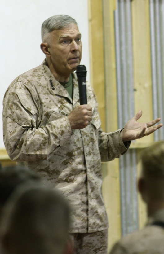 The Commandant of the Marine Corps General James T. Conway addresses Marines in Camp Al Taqaddum during a brief visit Monday.