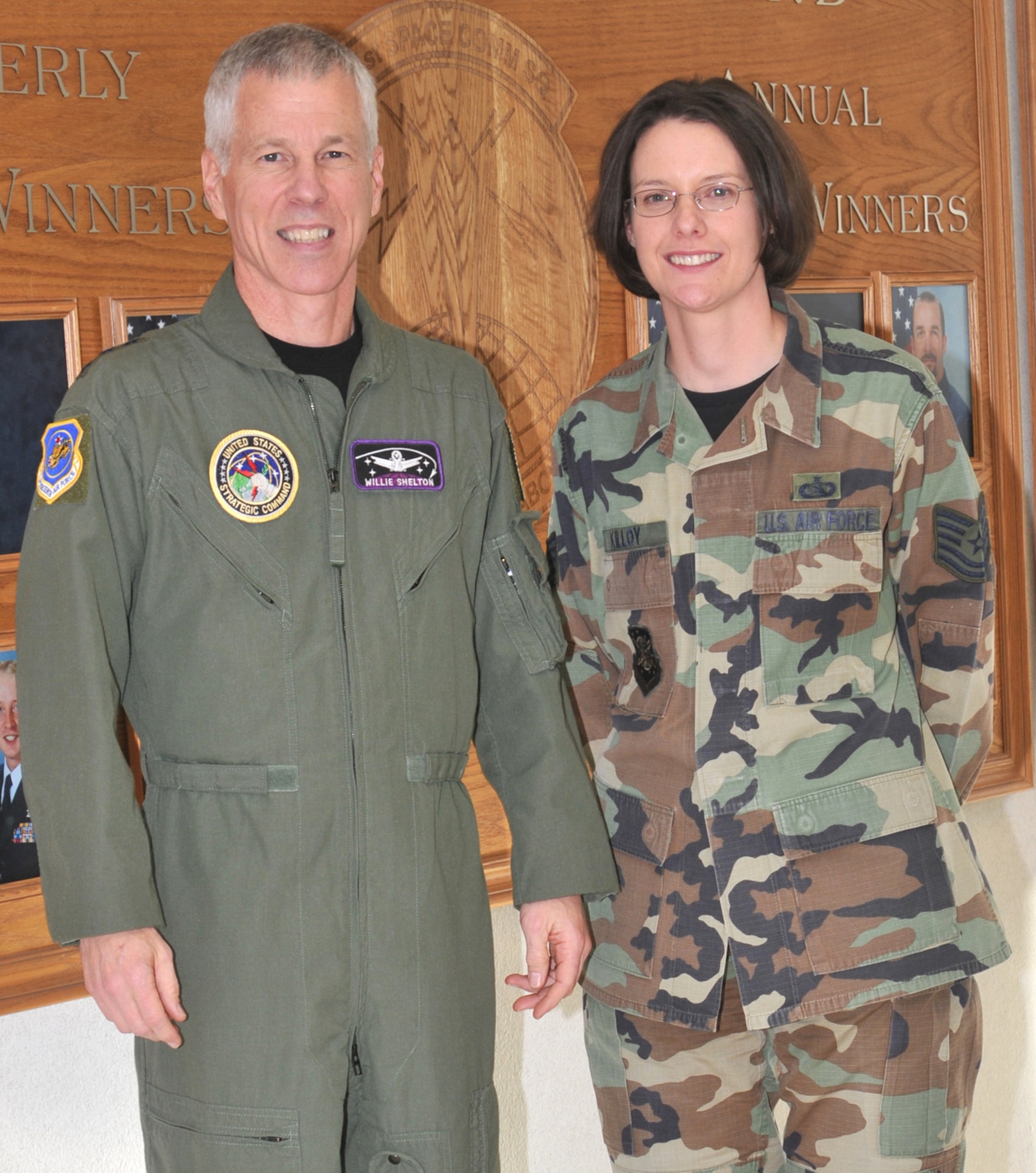 Tech. Sgt. Margaret Killoy stands with Lt. Gen. William Shelton, 14th Air Force commander, after being STEP promoted to technical sergeant Feb. 7. Sergeant Killoy was promoted under the Stripes for Exceptional Performers, or ‘STEP’ program. When asked how he felt about being able to STEP promote Sergeant Killoy, General Shelton said, "One of the great privileges of command is the ability to recognize
outstanding performance by our Airmen. In a special category of that
privilege is STEP promotions. Being able to instantly promote someone who
is so deserving is truly special and enjoyable." Sergeant Killoy is the NCO in charge of the 21st SW computer security. (U.S. Air Force photo)
