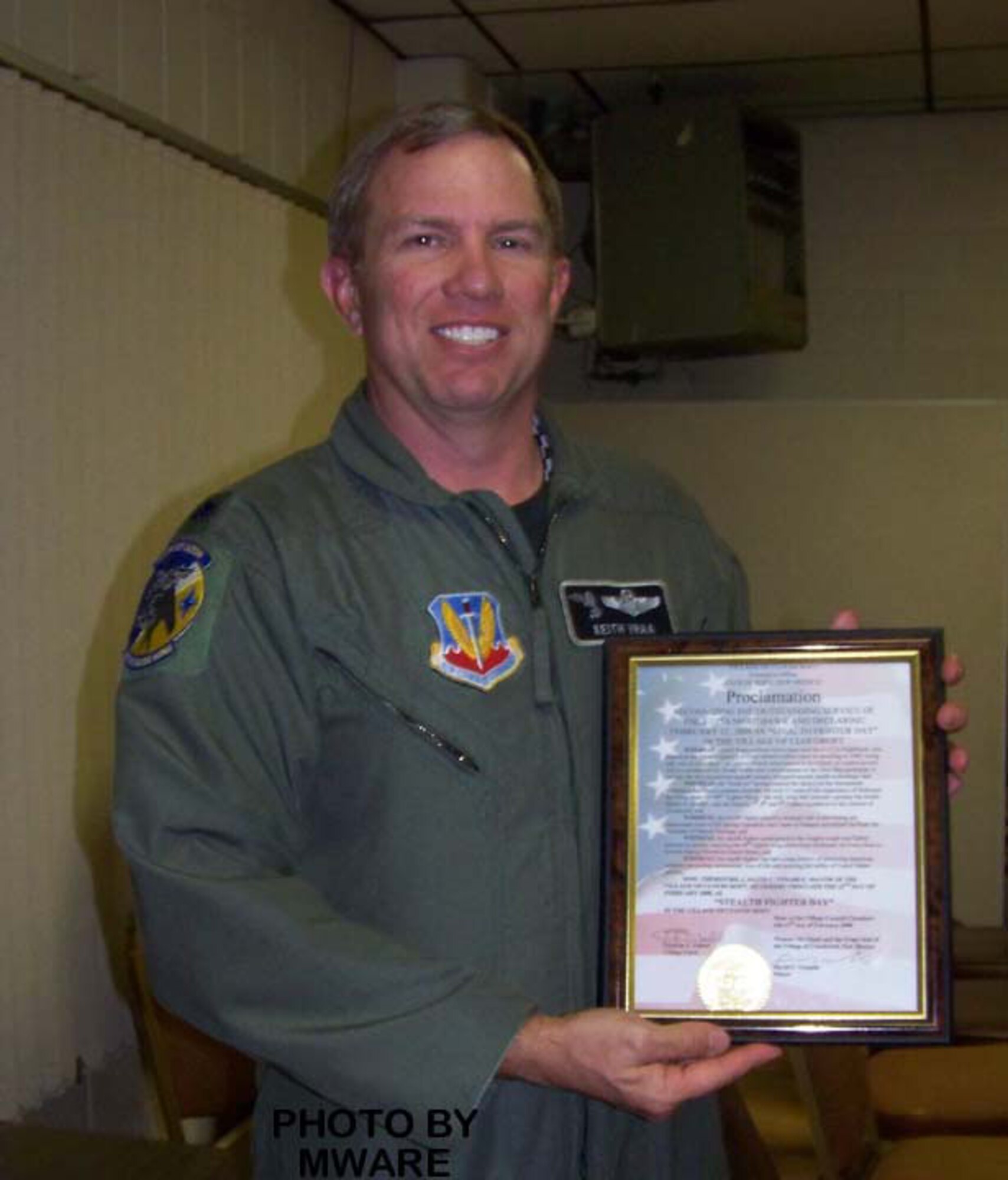 Lt Col Keith Vraa, 49th Fighter Wing director of staff, accepts the F-117 proclamation at the Cloudcroft Village Council meeting on Feb. 12, 2008.
(Submitted by Senior Airman Anthony Nelson Jr) 