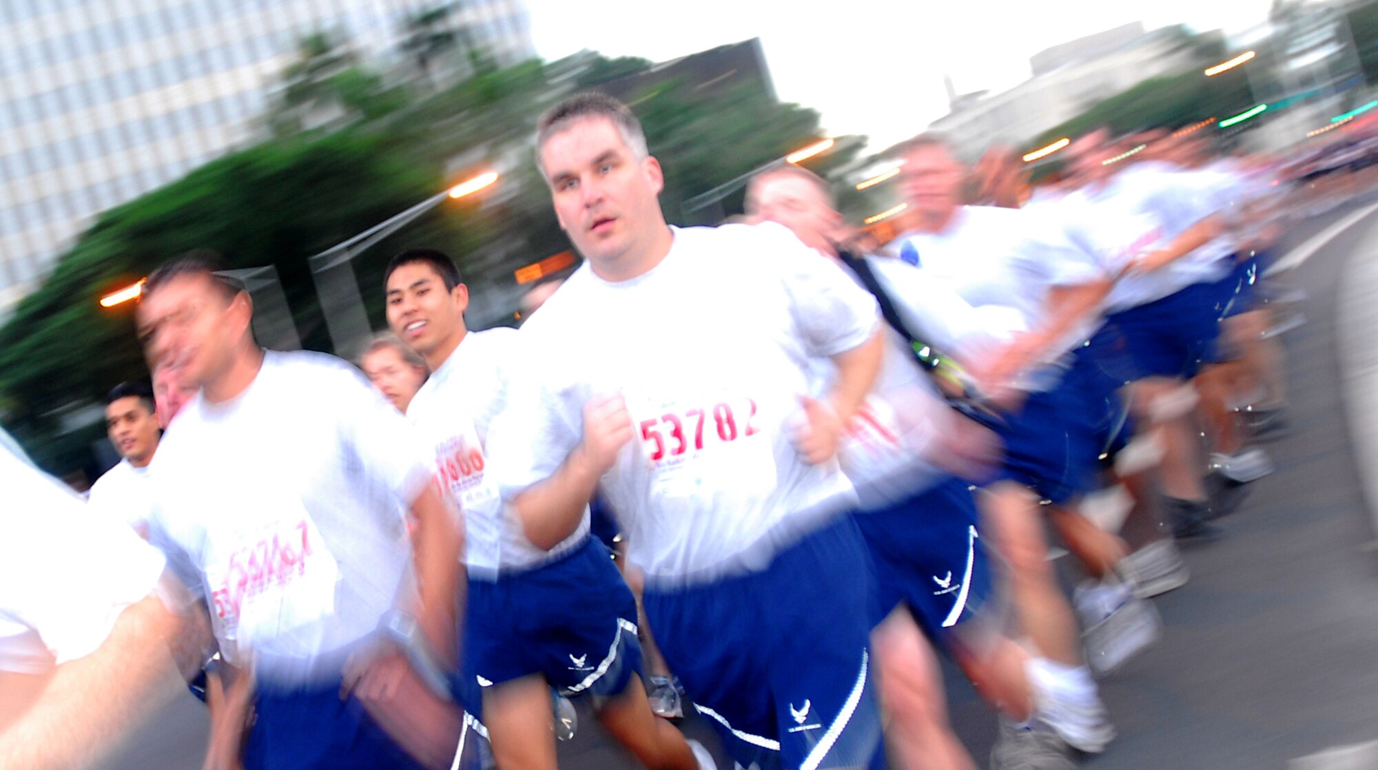 The 62-man Air Force formation is the largest Hickam Formation to participate in the Great Aloha Run. Runners in the formation finished the run as a formation in 1 hour, 19 minutes, maintaining an overall pace of a 10-minute-mile throughout the 8.1 mile run stretching from Aloha Tower to Aloha Stadium. Photo by Staff Sgt. Erin Smith.