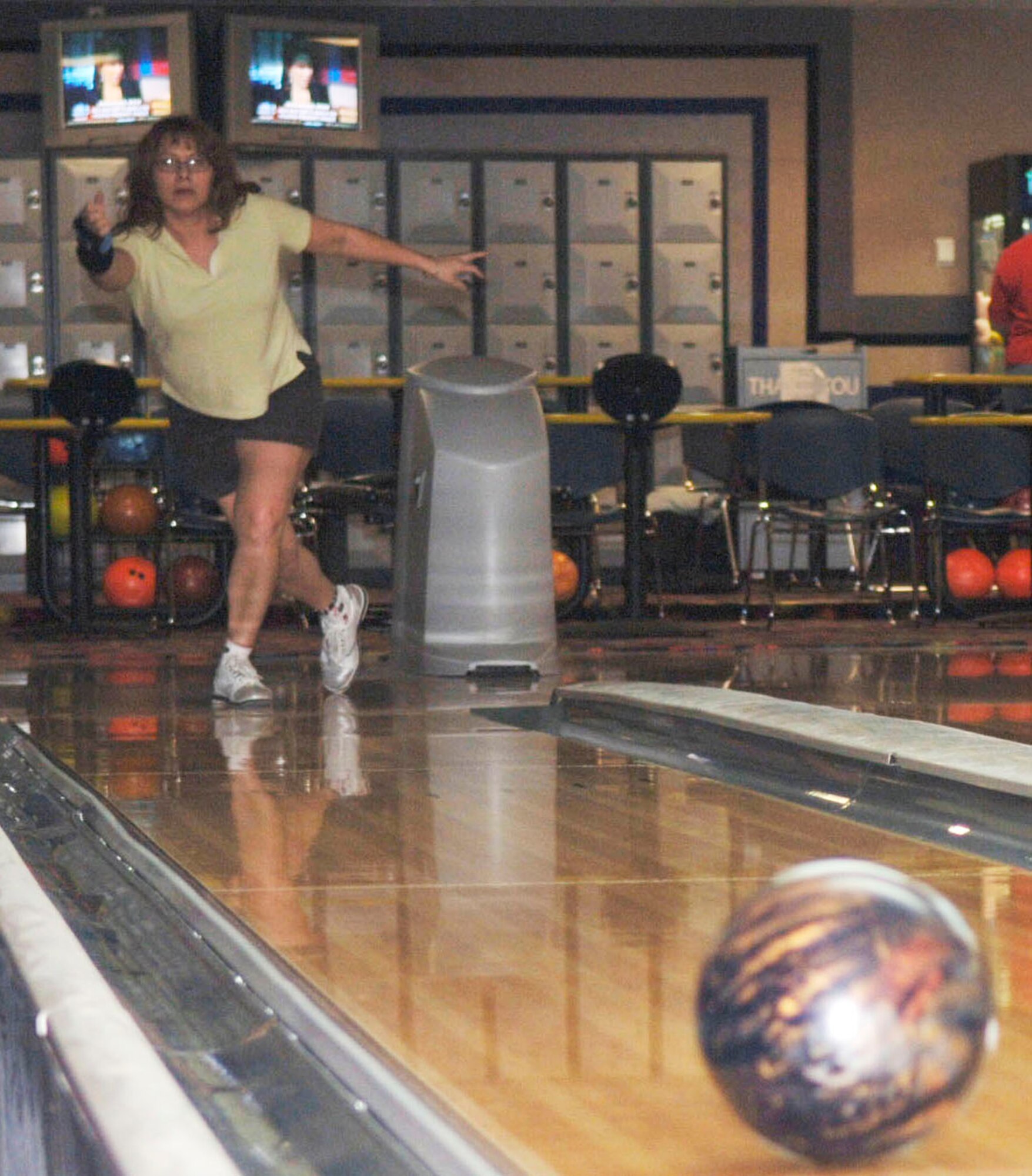 Donna Brown, an executive assistant in the Air Force Special Operations Command headquarters’ A4 directorate, hopes for the best after releasing her bowling ball. Ms. Brown, who last year won the women's U.S. Open for bowling, recently bowled a 764 series at the base bowling alley.