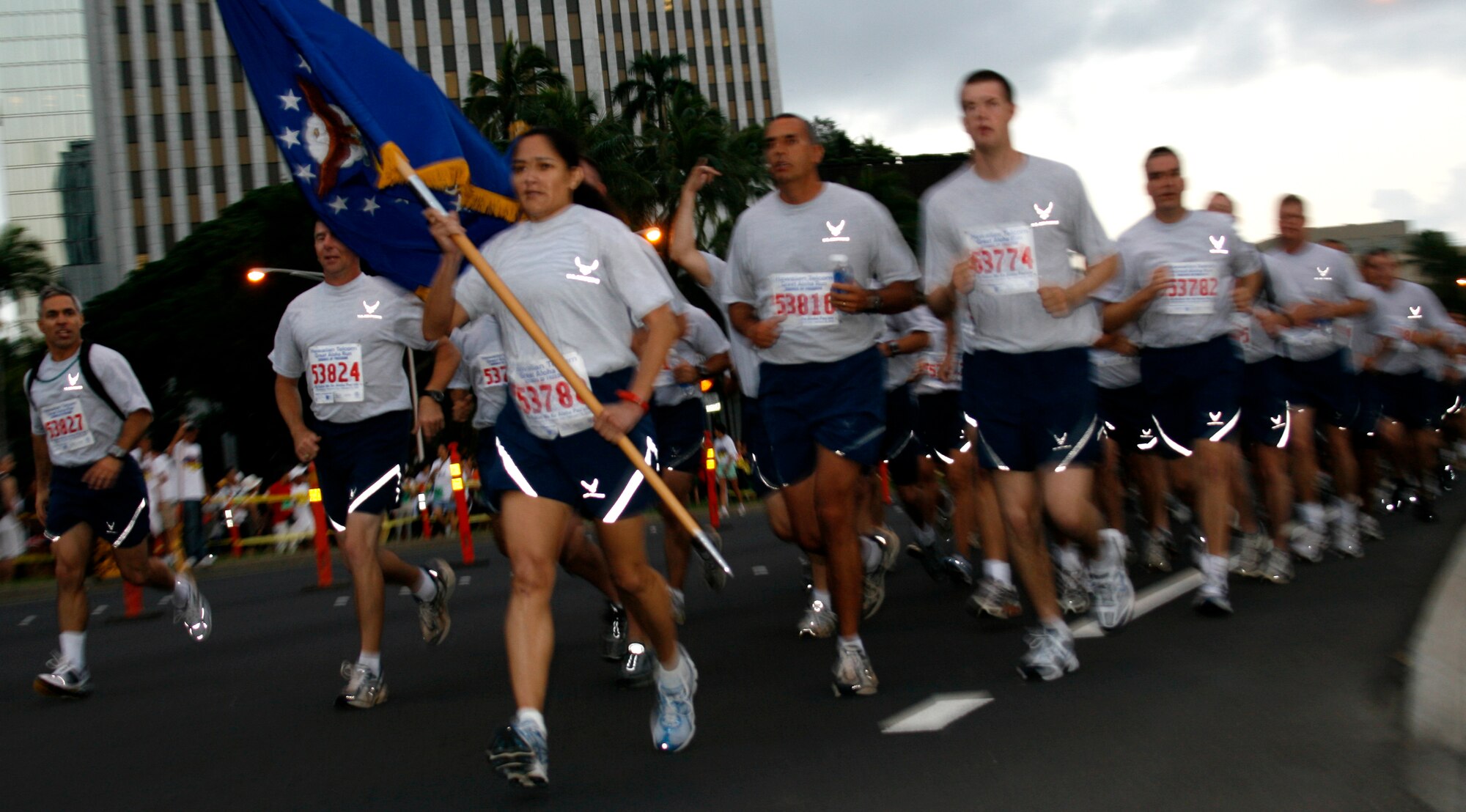 A formation of Team Hickam runners take off from the Aloha Tower during the annual Hawaiian Telecom Great Aloha Run, Feb. 18. More than 20,000 participants came out for the event. Photo by Staff Sgt. Erin Smith.